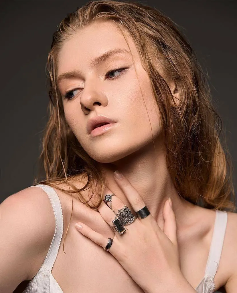 Portrait of a Pensive Woman with Wet Hair And a Tank Top