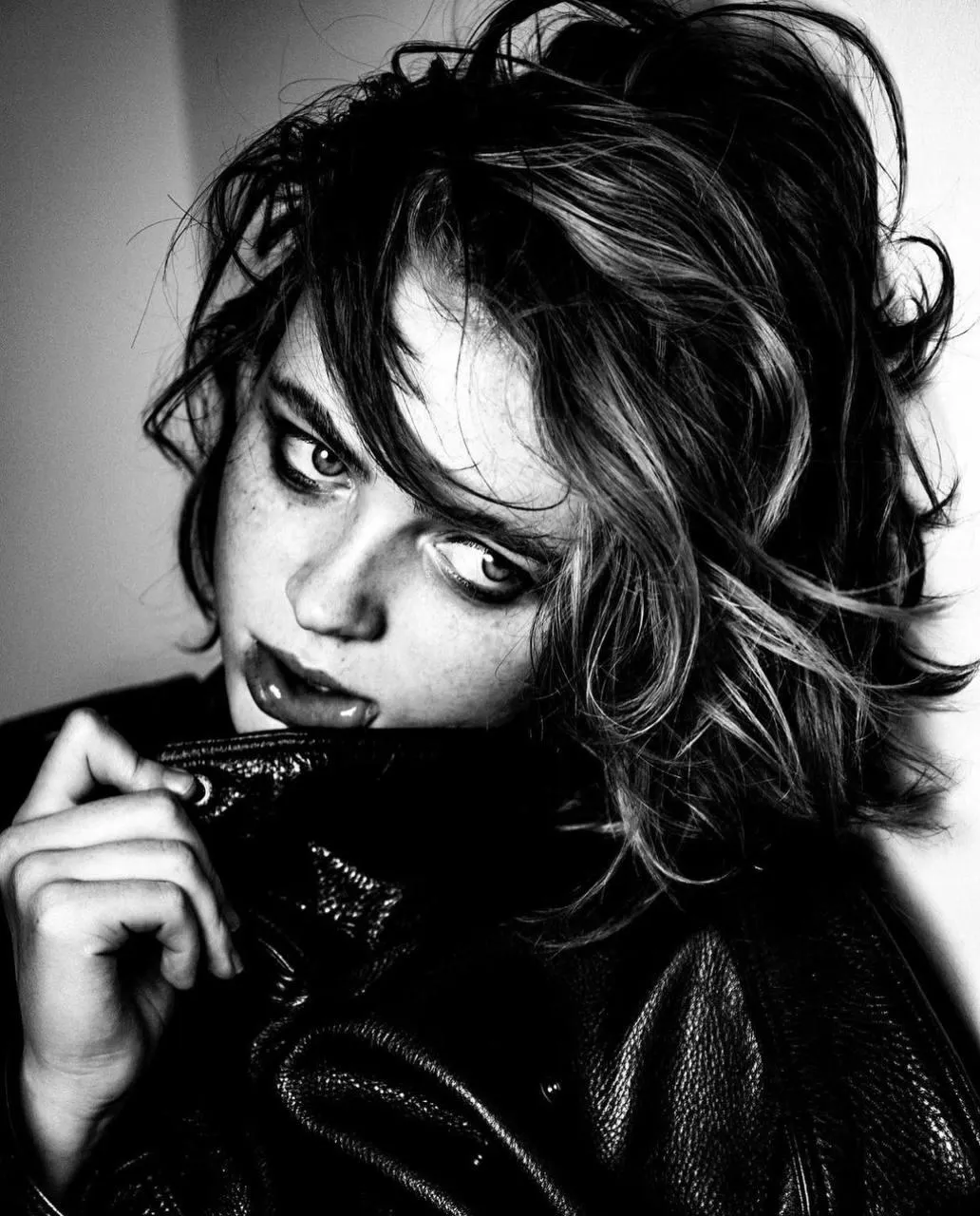 Retro Black And White Image of Woman with Messy Hairstyle