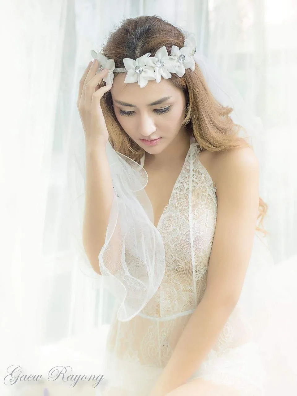 Soft Bridal Style Portrait with Veil And Delicate Expression