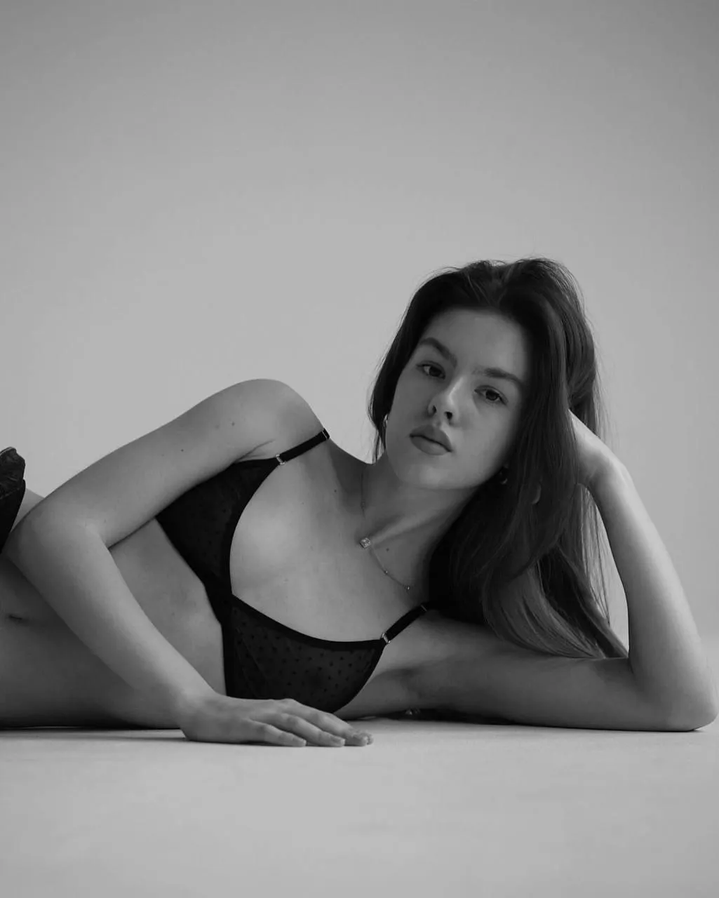 Stylish black lingerie portrait of a confident young woman