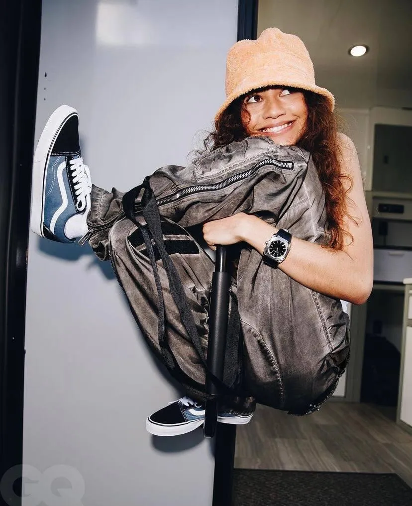 Trendy Woman in a Puffy Coat And Hat with a Bold Street Pose