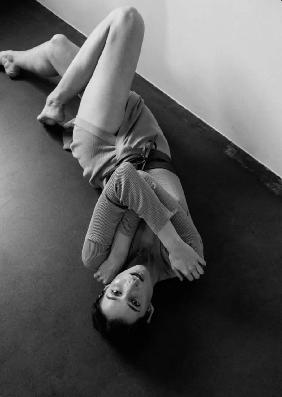 Upside Down Pose of a Model in a Grayscale Fashion Portrait