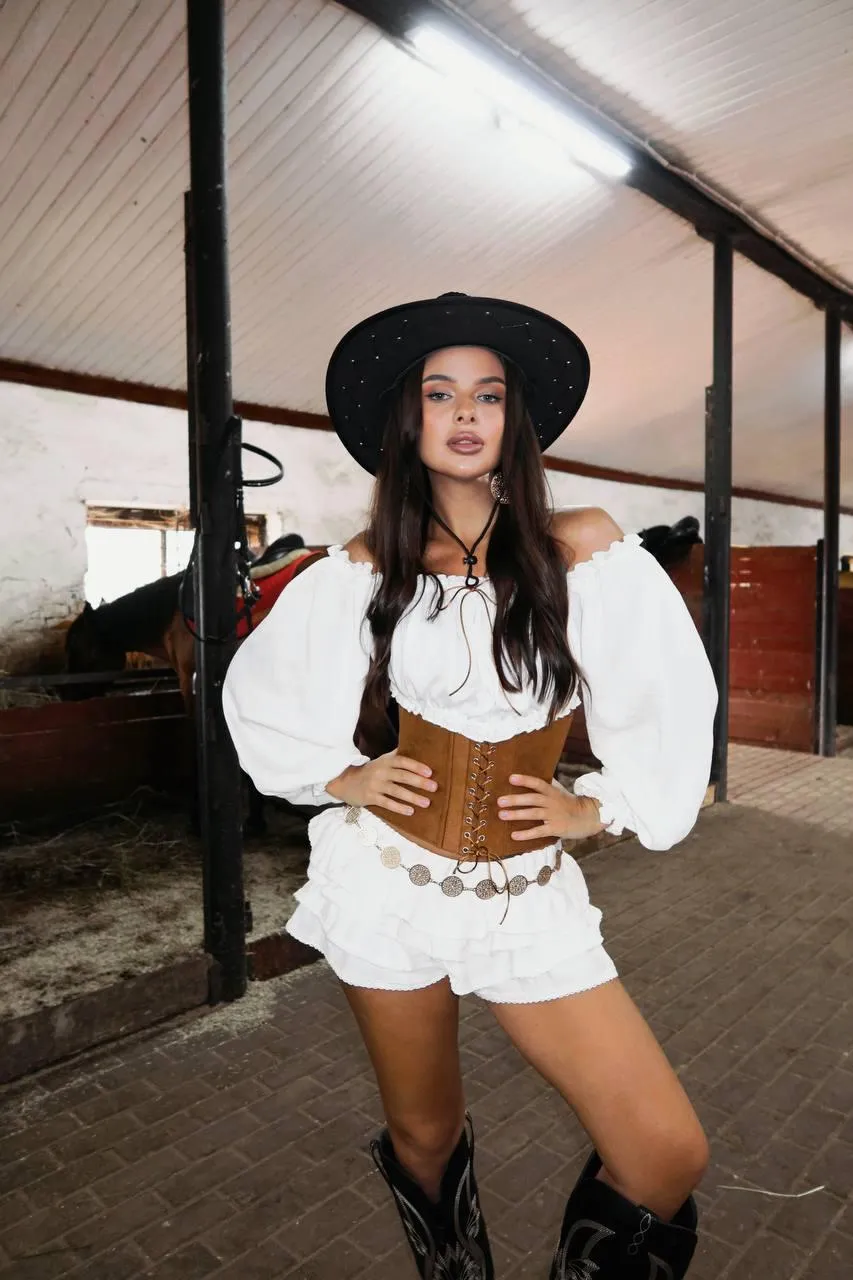 Western Inspired Outfit with Boots And a Wide Brim Hat Image