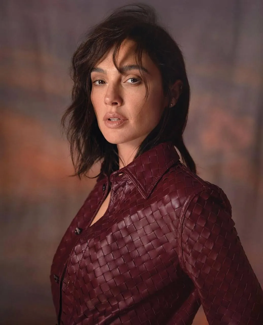 Woman in a Maroon Jacket Looking Confidently Free Wallpaper