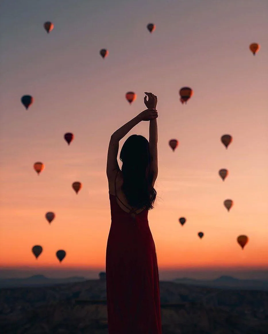 Woman in a red robe dress with her hand raised HD wallpaper