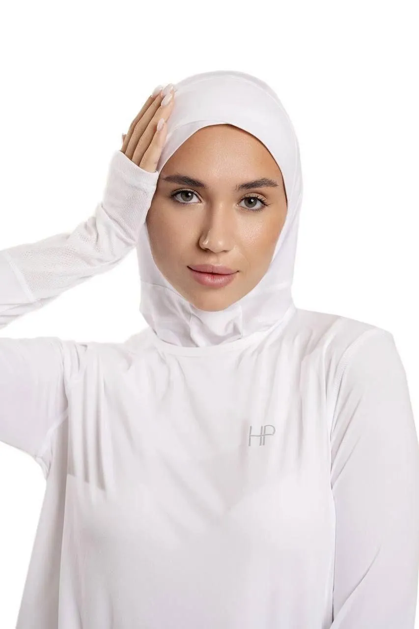 woman in a white sports hijab with hand on her head image