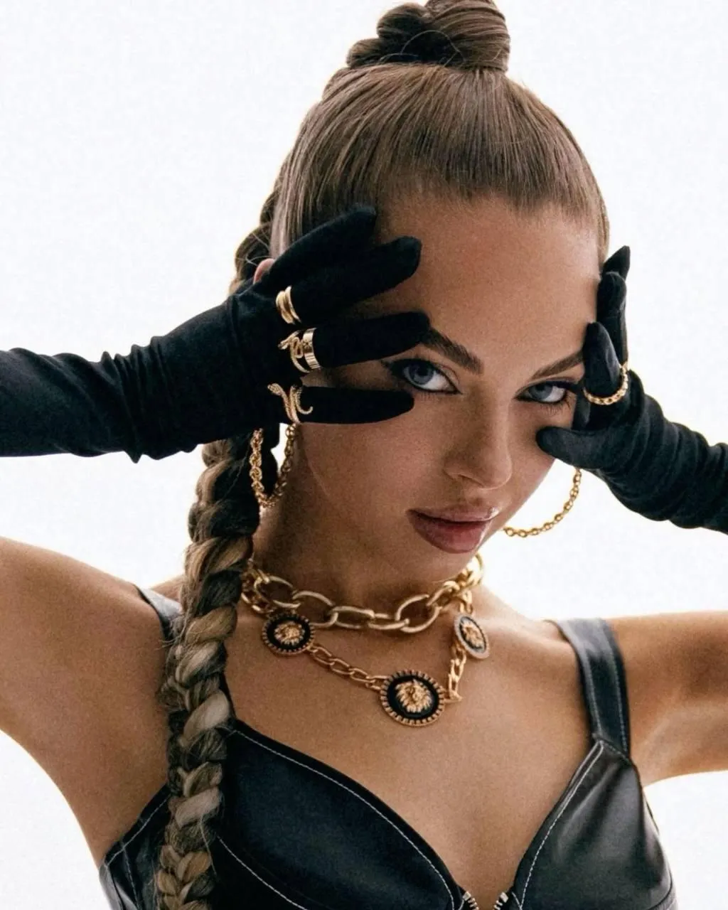 Woman in Edgy Leather Look with Gloves And Slick Hairstyle