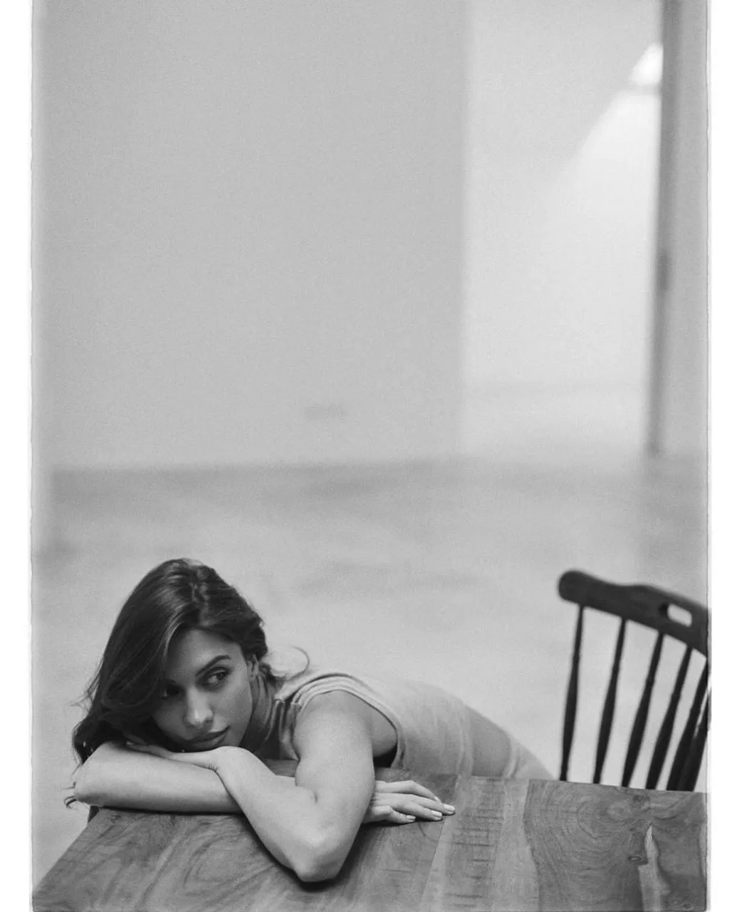 Woman Lying on a Chair in a Minimal Outfit HD Free Wallpaper