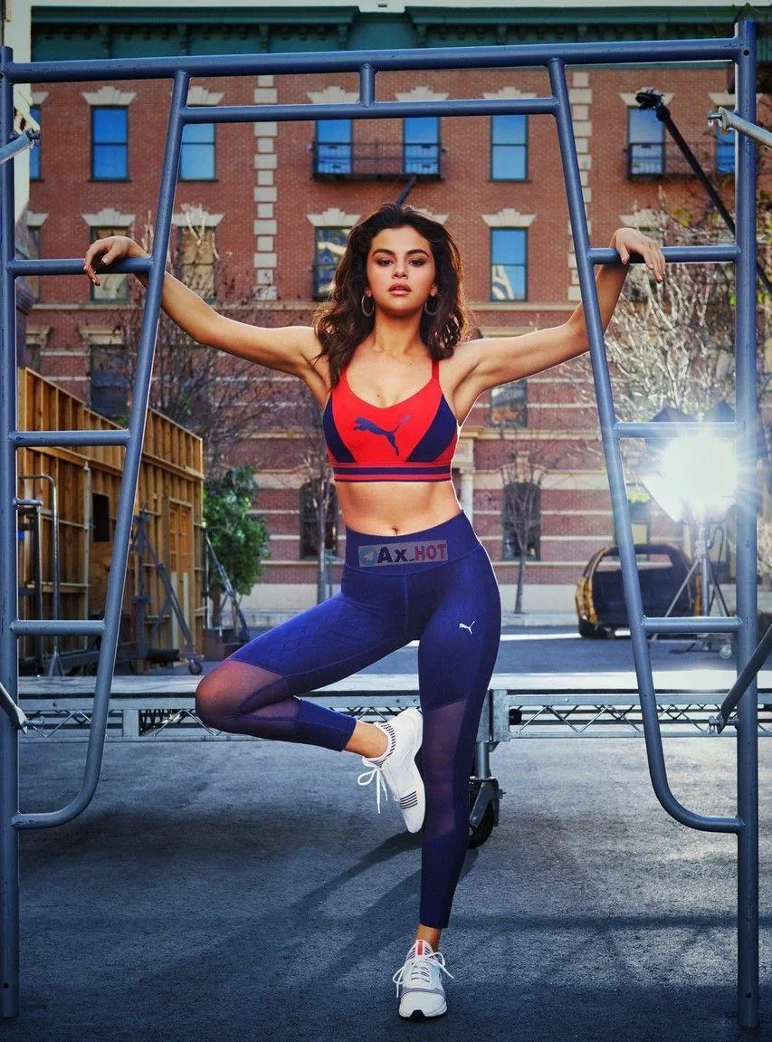 Woman Strikes Fitness Pose Outdoors in a Colorful Outfit