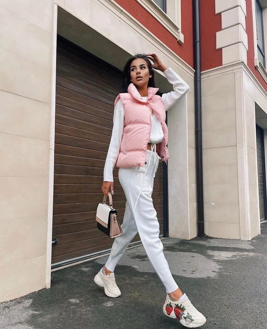 Woman Walking Confidently in a Casual Urban Outfit Outdoors