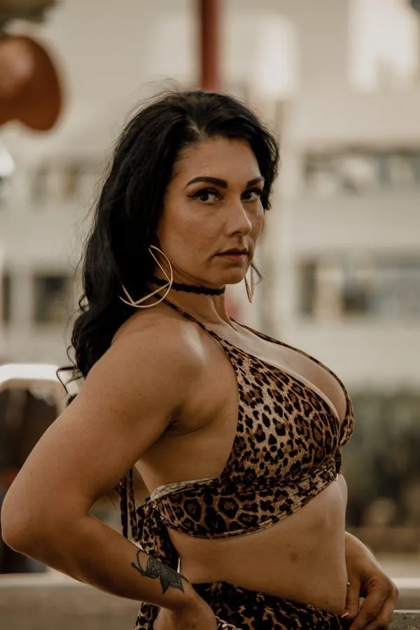 woman wearing a leopard bikini standing in the outdoors