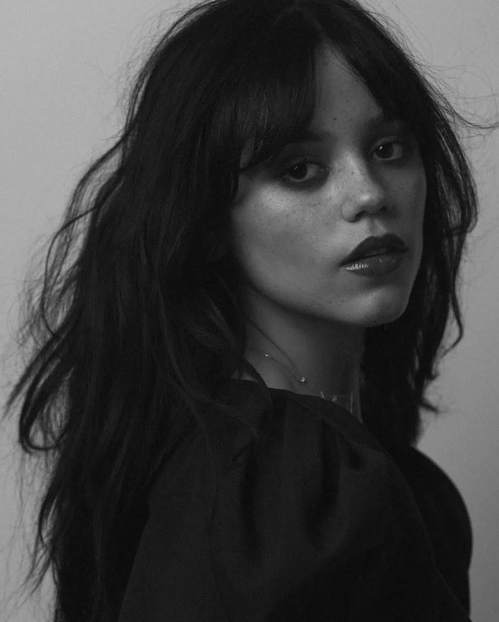 Woman with Tousled Hair in a Dramatic Black And White Photo