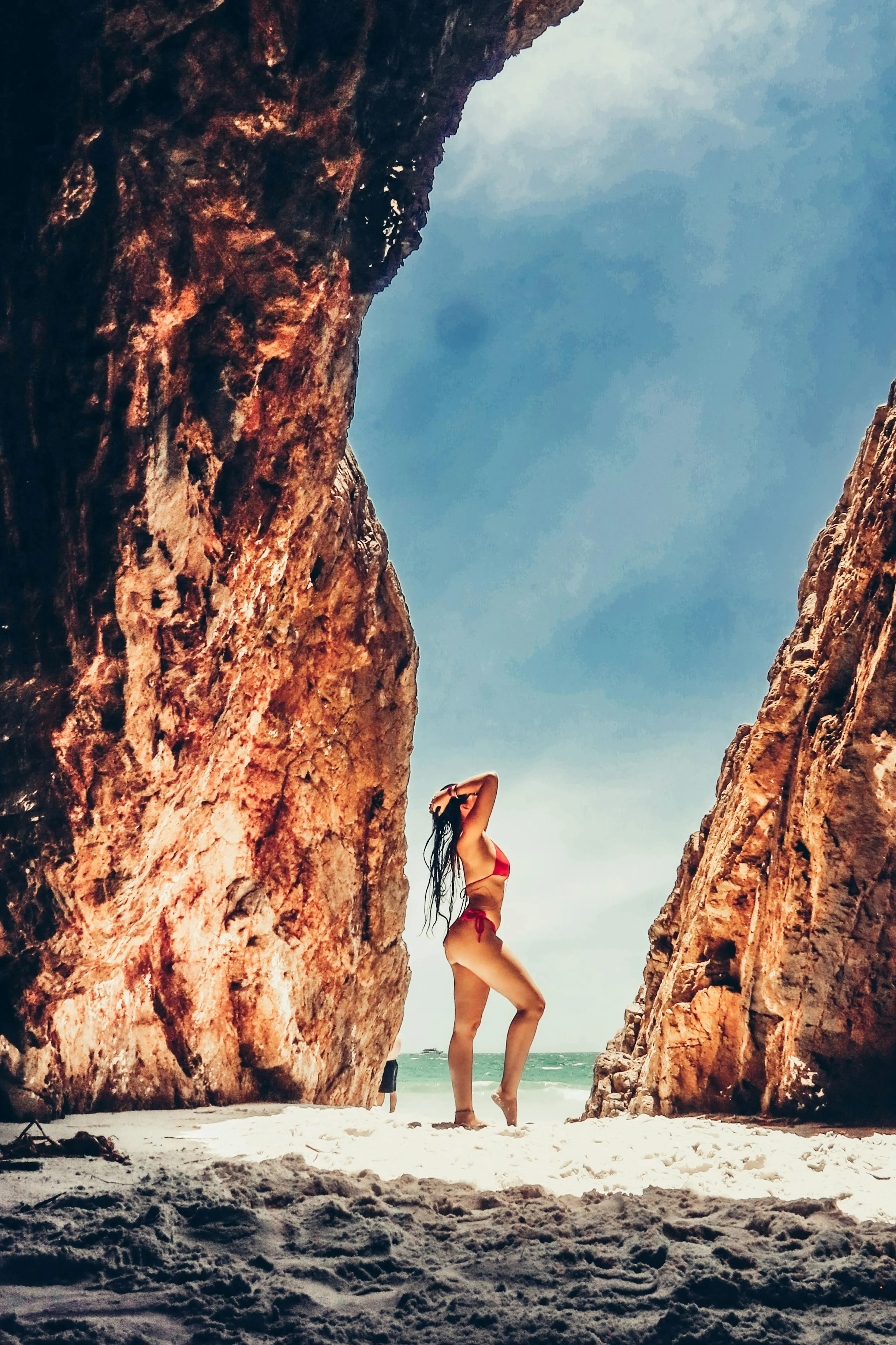 Women Exploring a Sunlit Canyon in Swimwear Set Wallpaper