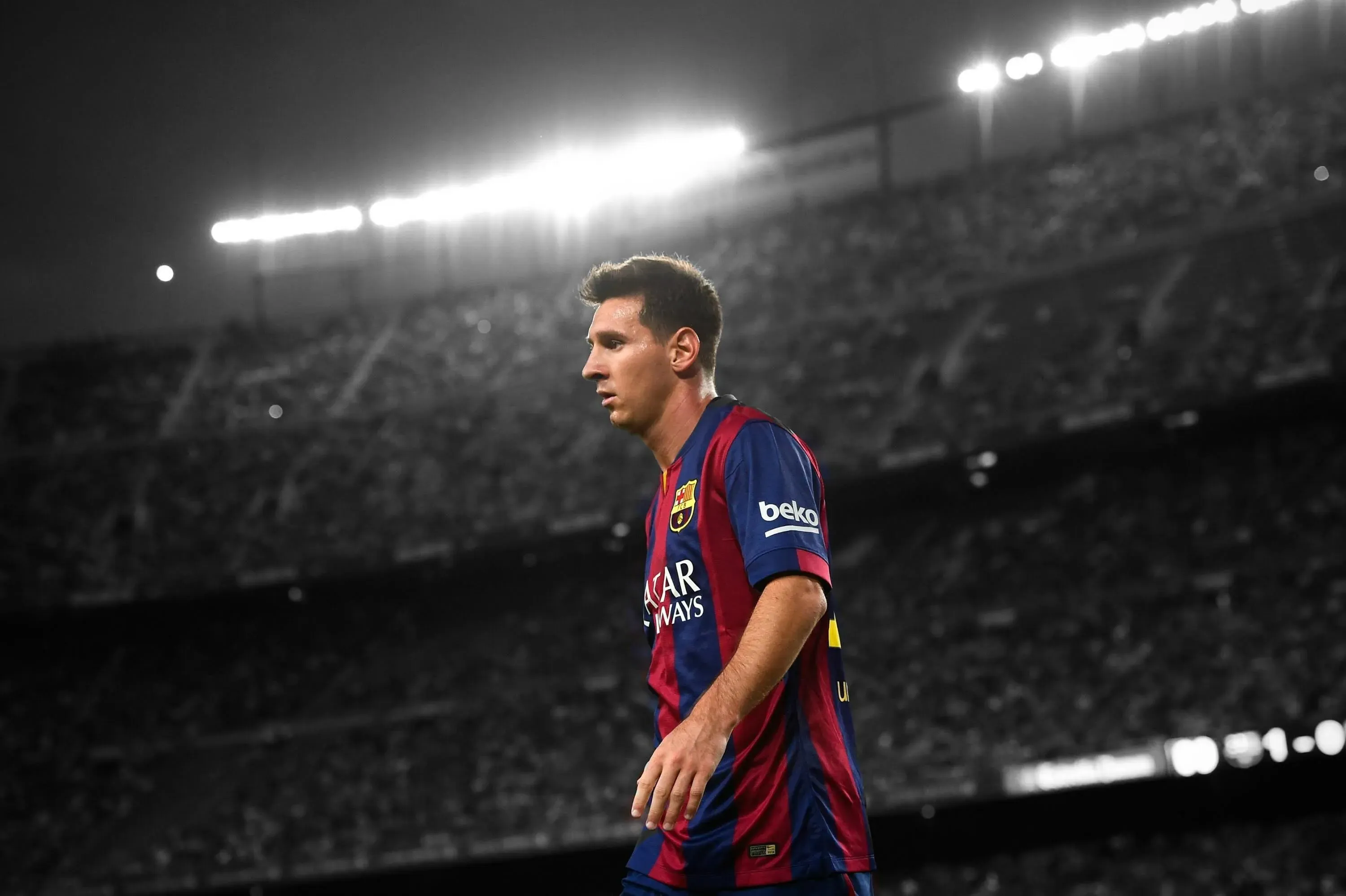 The Captain Of Barcelona Walking on The Ground Lionel Messi