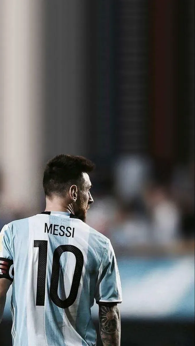 Lionel Messi In An Argentina Jersey Portrait Wallpaper