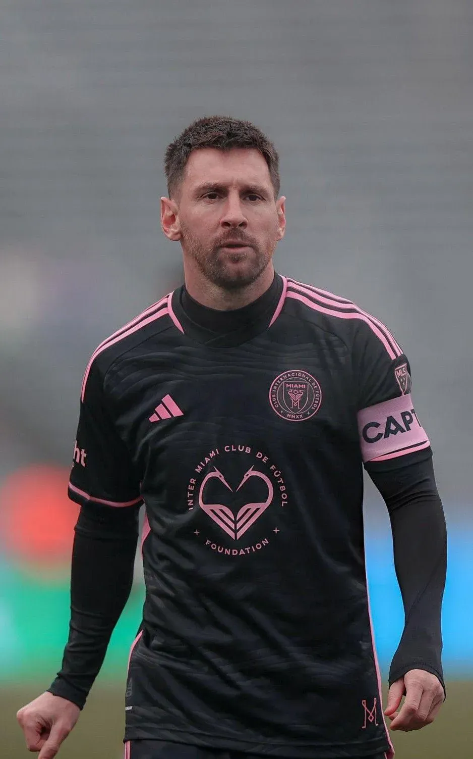 Lionel Messi Cartoon Playing on A Football Ground Wallpaper