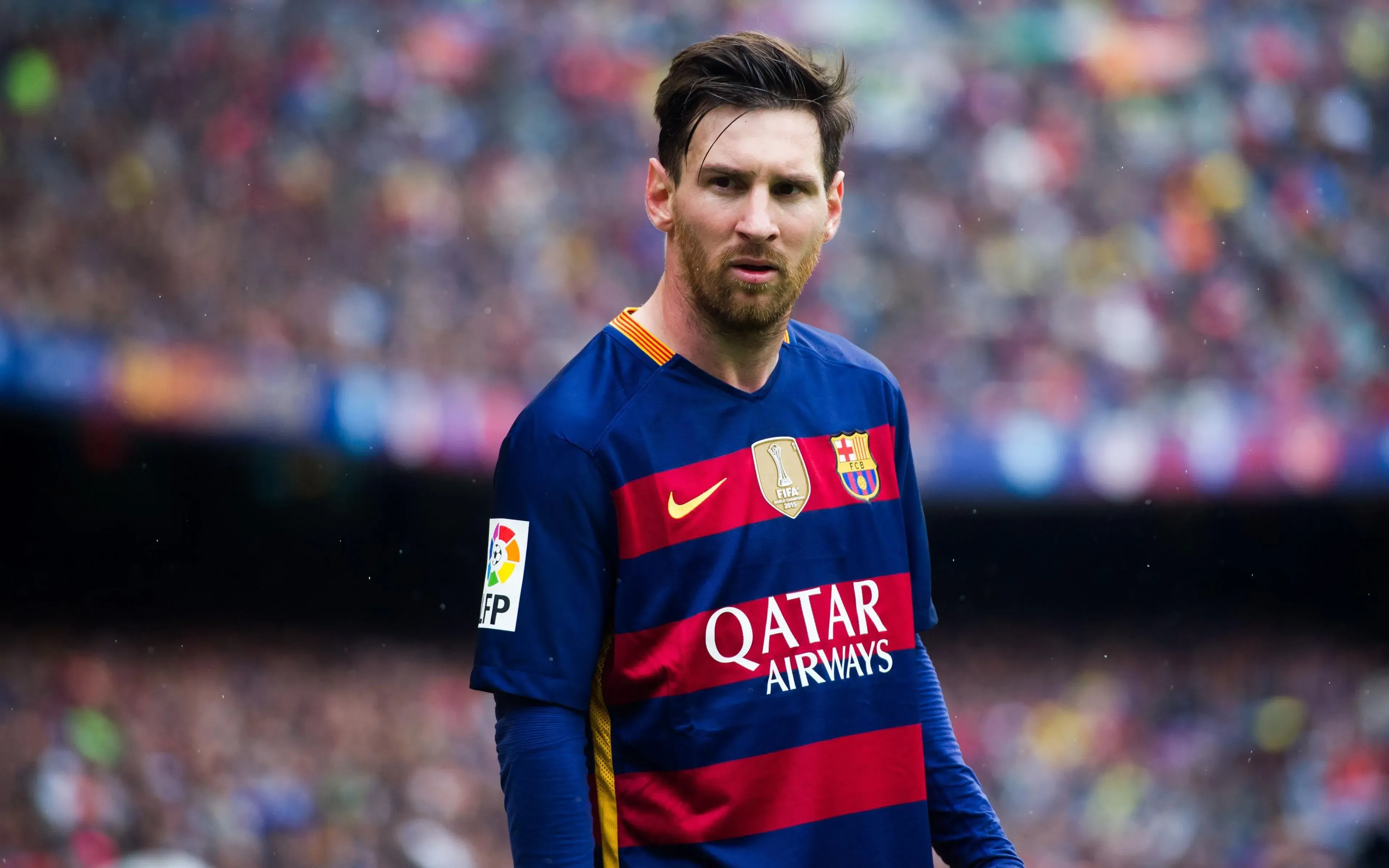 Lionel Messi At Barcelona Iconic Football Moments Wallpaper