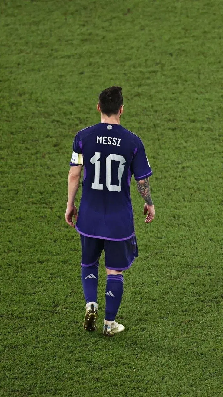 Messi In A Blue Jersey With His Iconic Number 10 Wallpaper