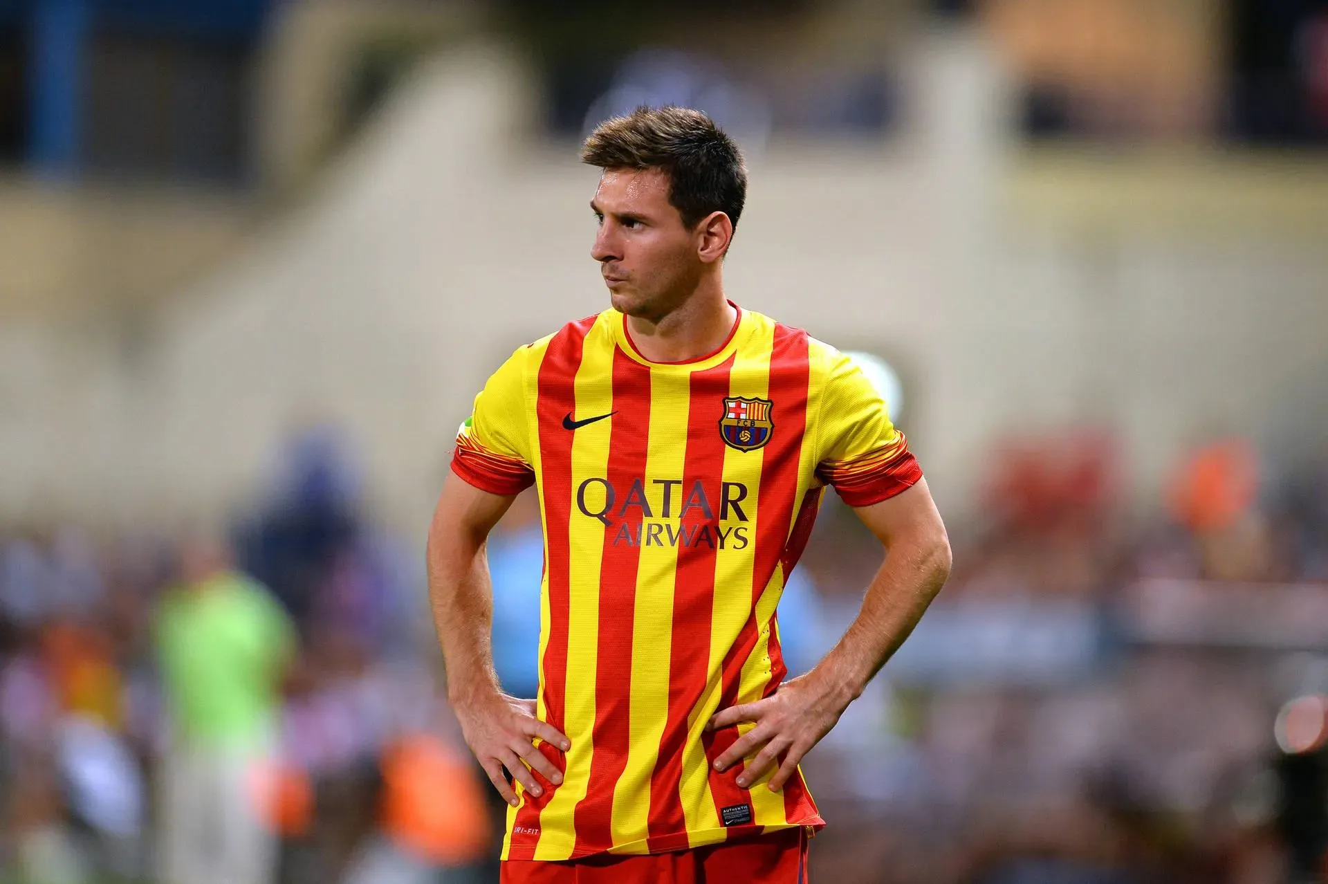 Lionel Messi Wearing Red And Yellow Jersey Of Barcelona