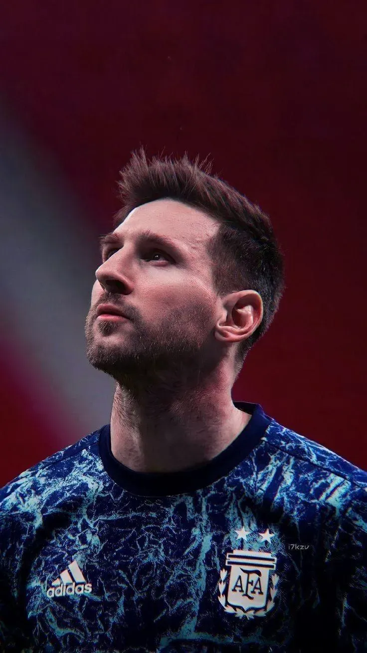 Portrait Mobile Wallpaper Of Messi In A Blue Dress For Free