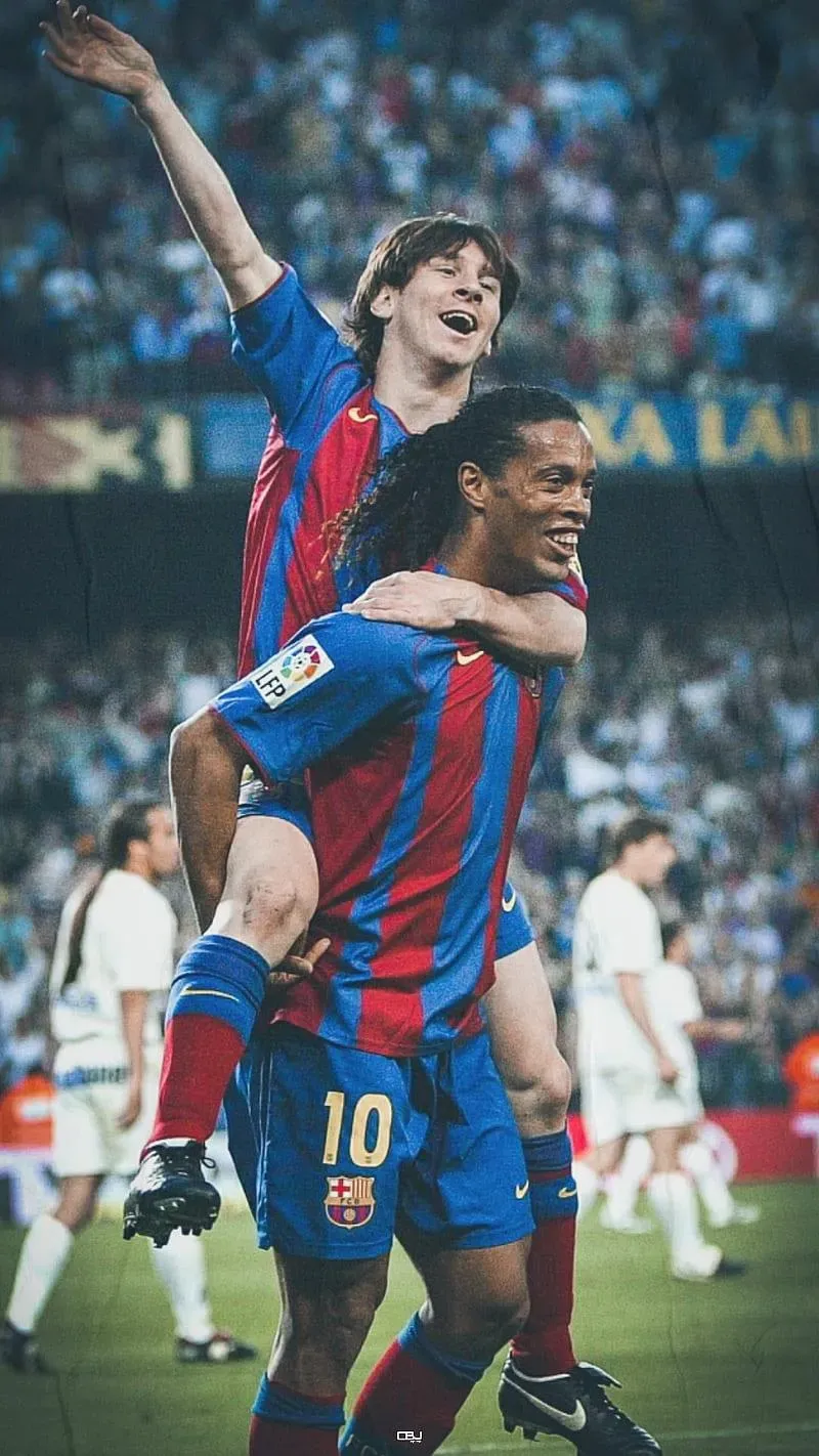 Young Lionel Messi And Ronaldinho Celebrate Together Image