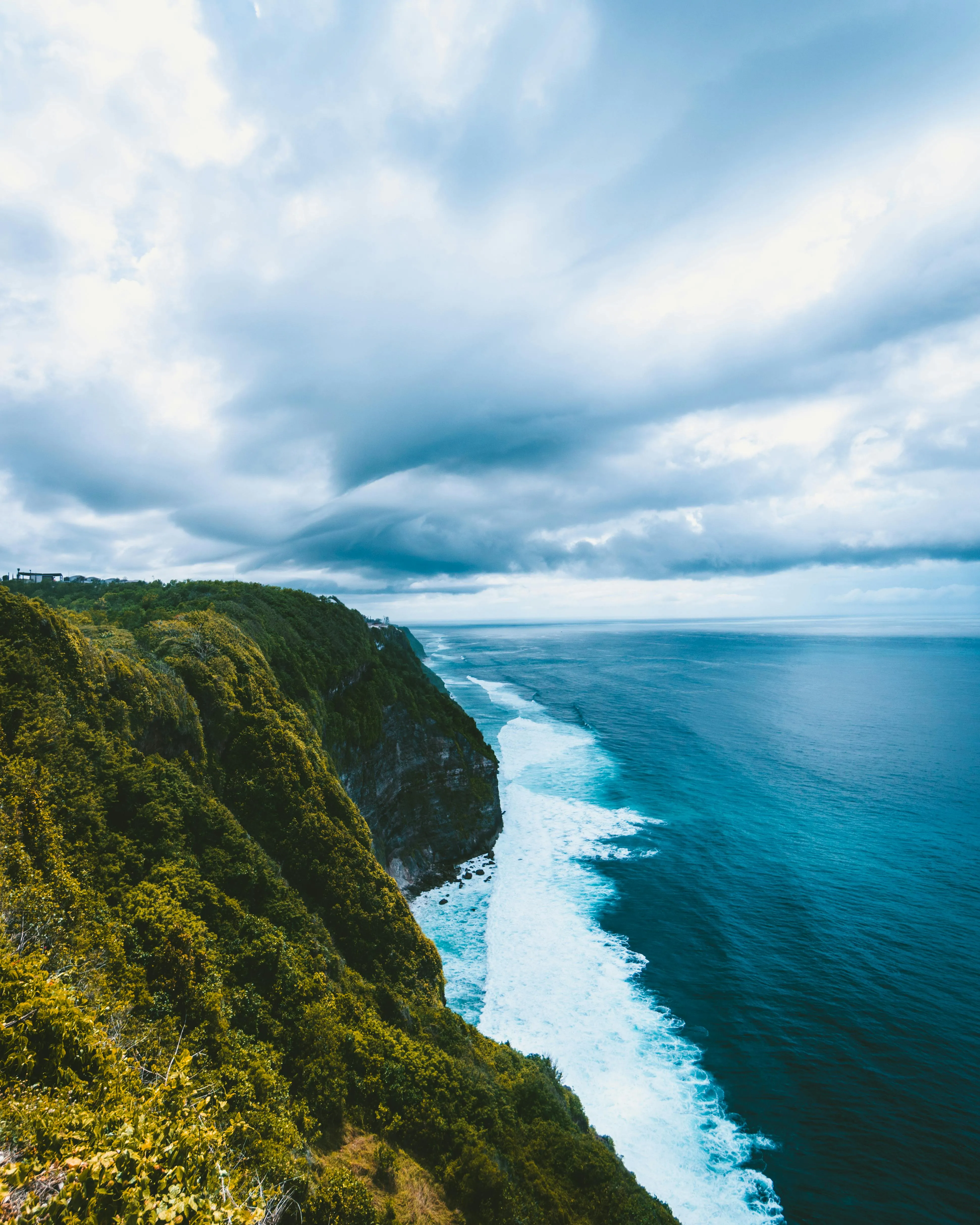 Aerial View of Coastline with Low Hanging Sea Clouds