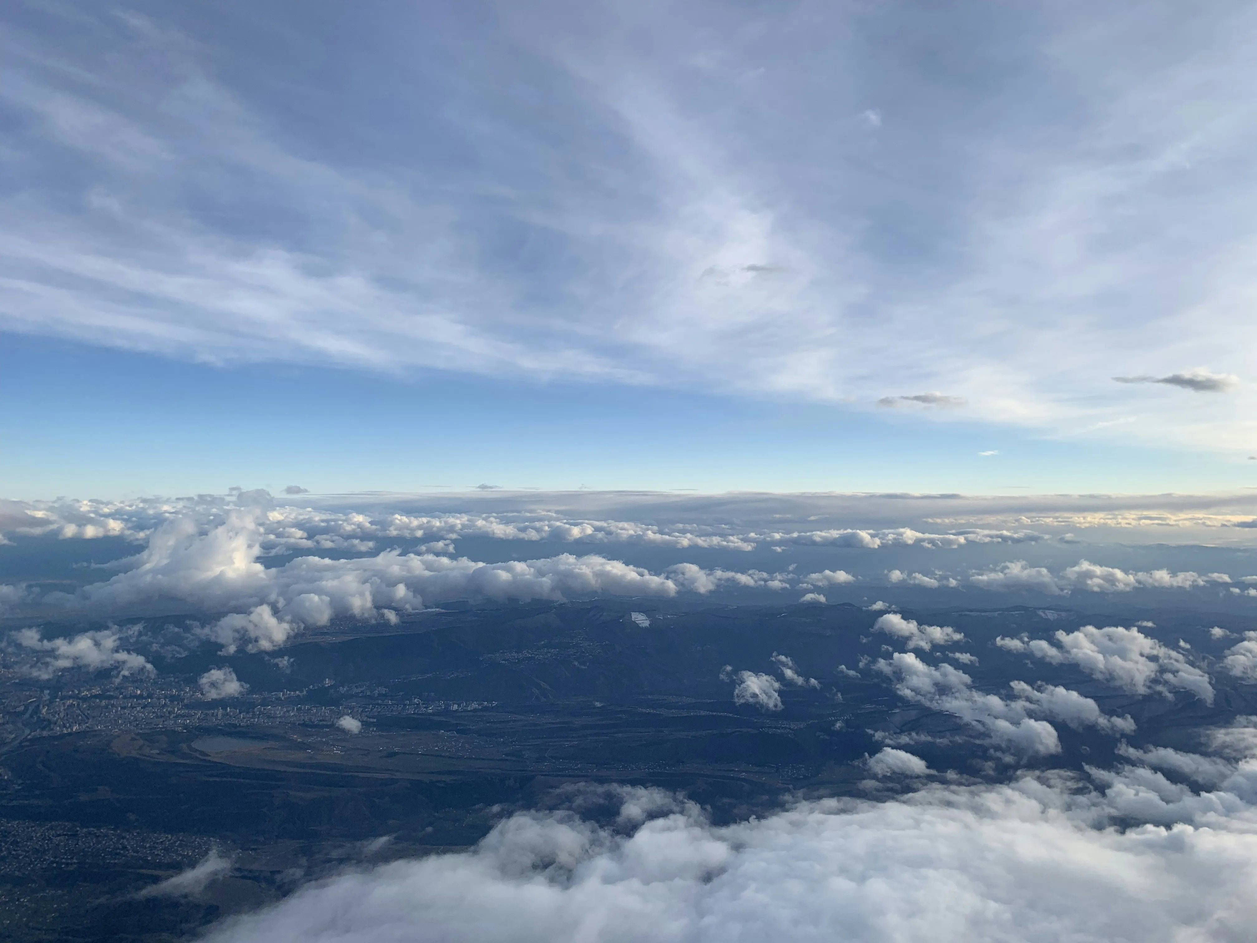 Aerial View of Sky with Wispy Cirrus Clouds HD Image