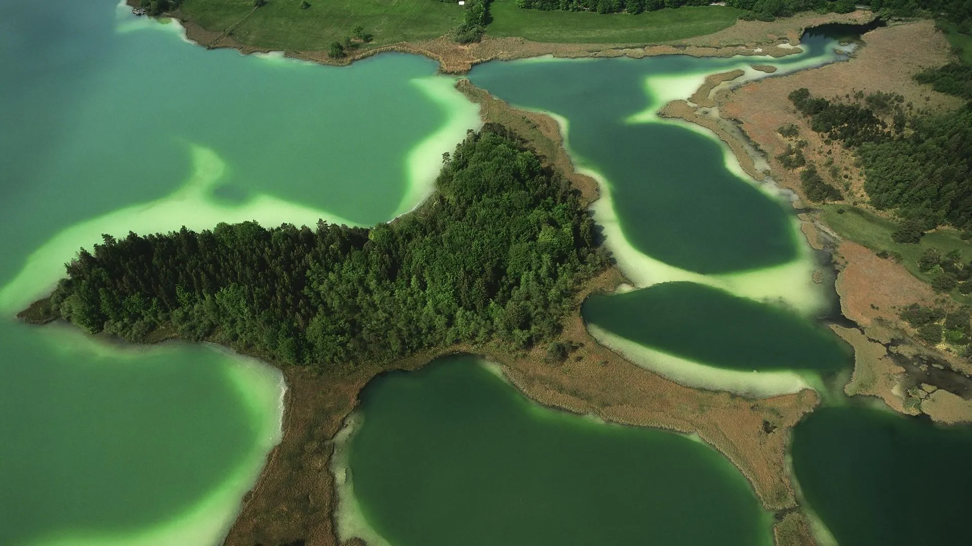 Aerial view of tropical islands in clear blue water