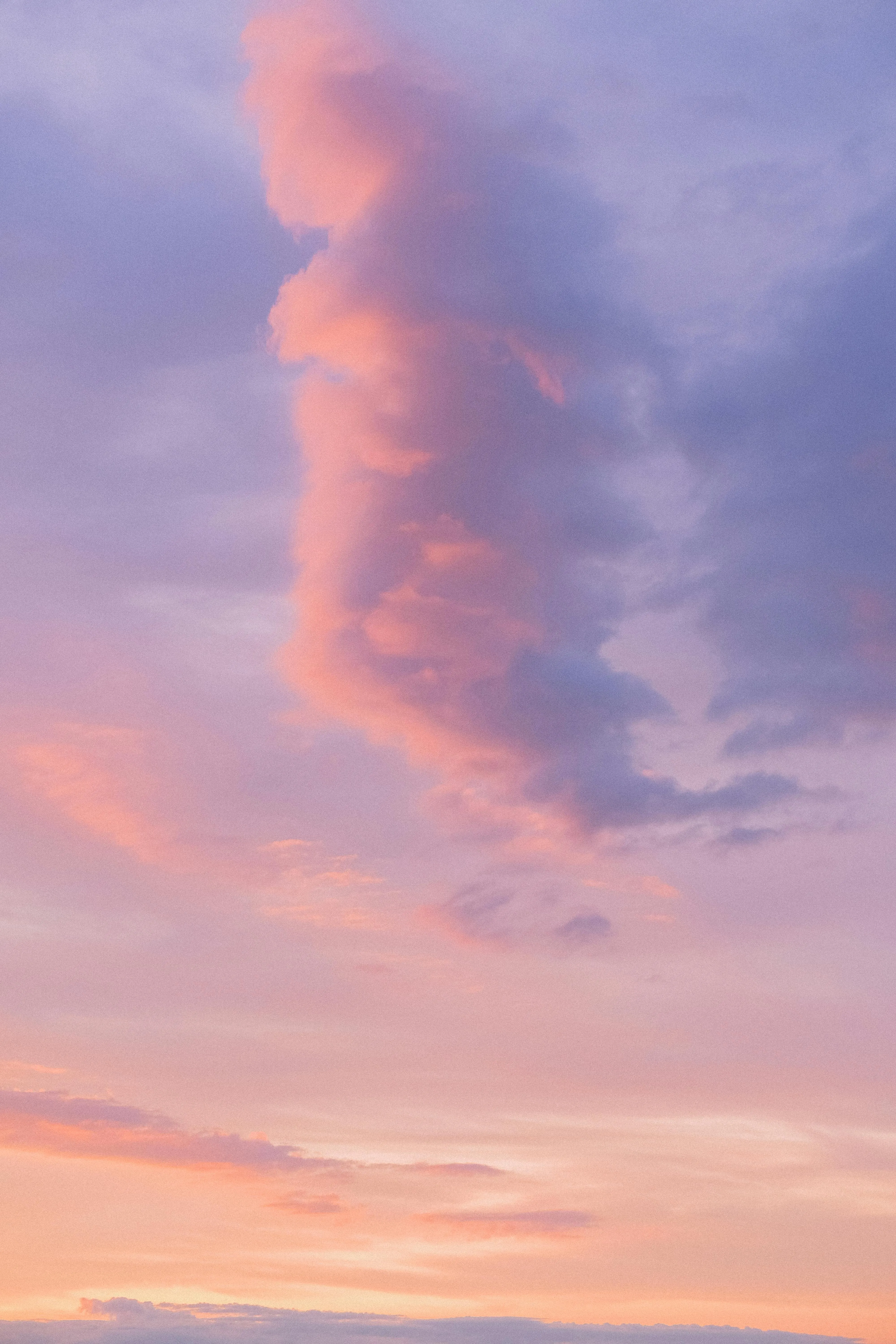 Beautiful Purple and Pink Clouds Over Horizon During Sunset