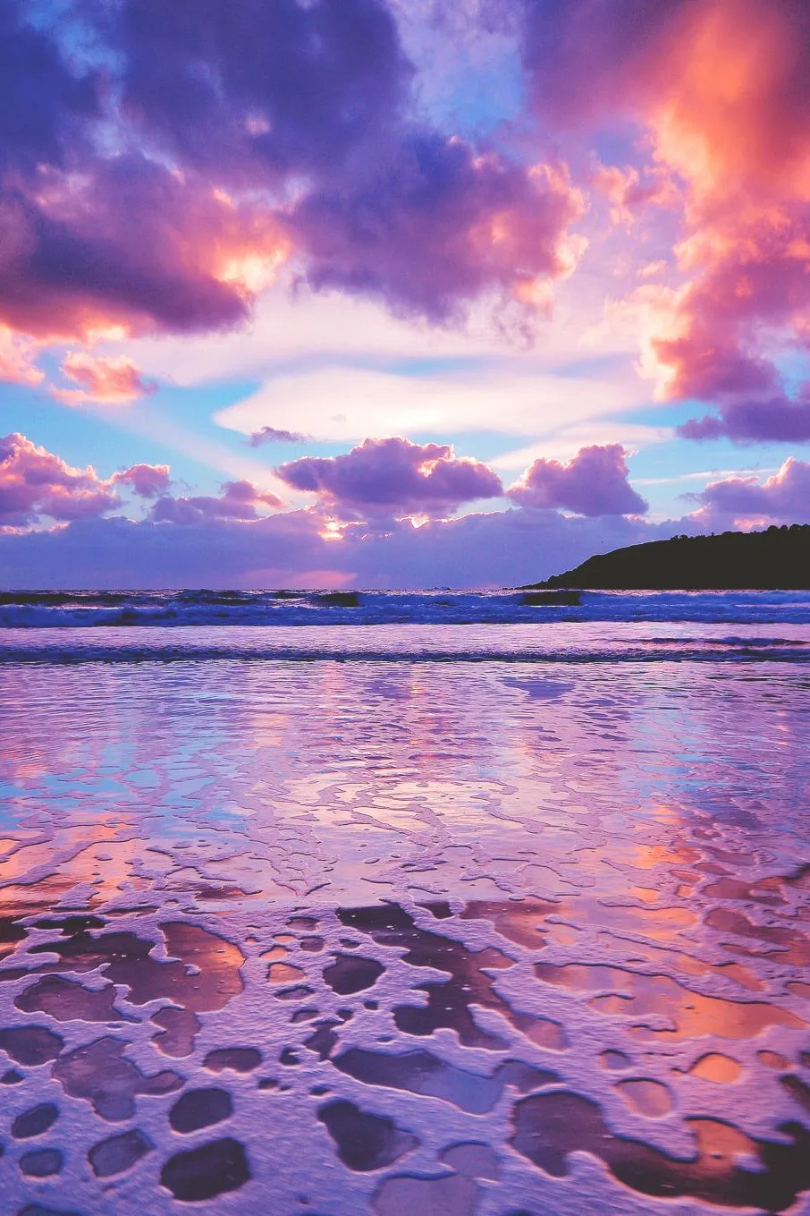 Beautiful Purple and Pink Clouds Reflecting on Ocean