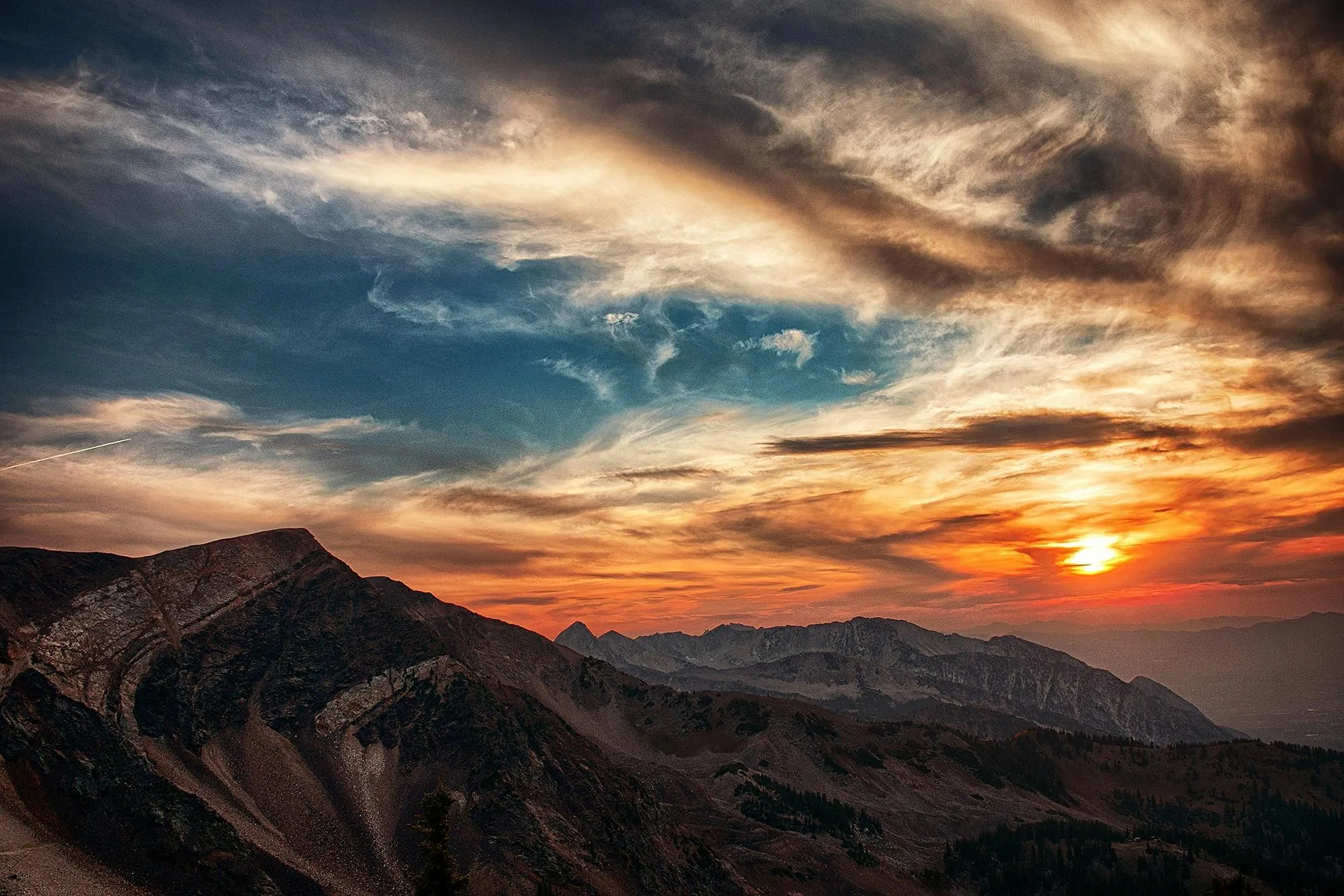 Beautiful Sunset with Vibrant Sky Over Mountains Wallpaper