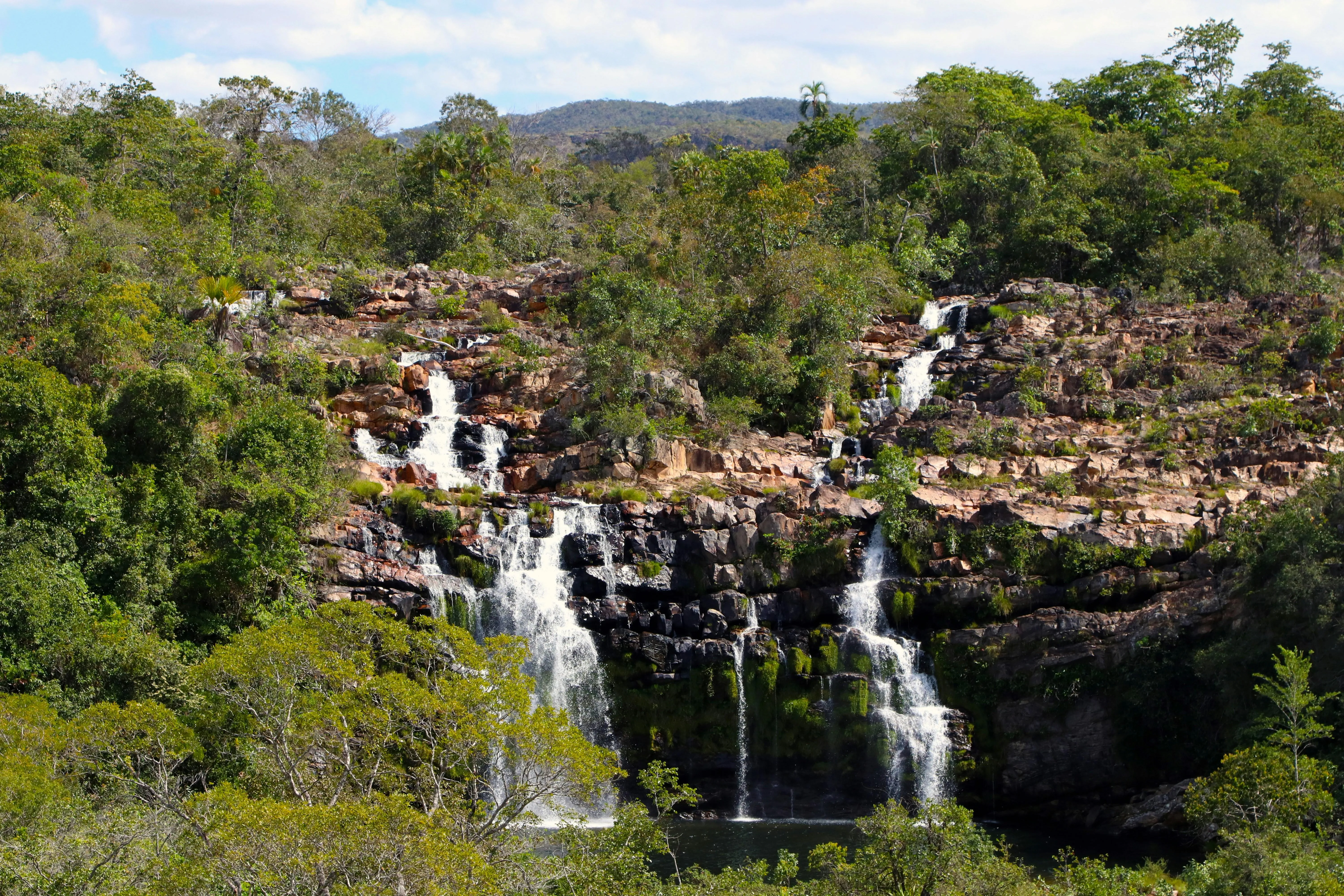 Beautiful waterfall cascading over rocks in a lush forest