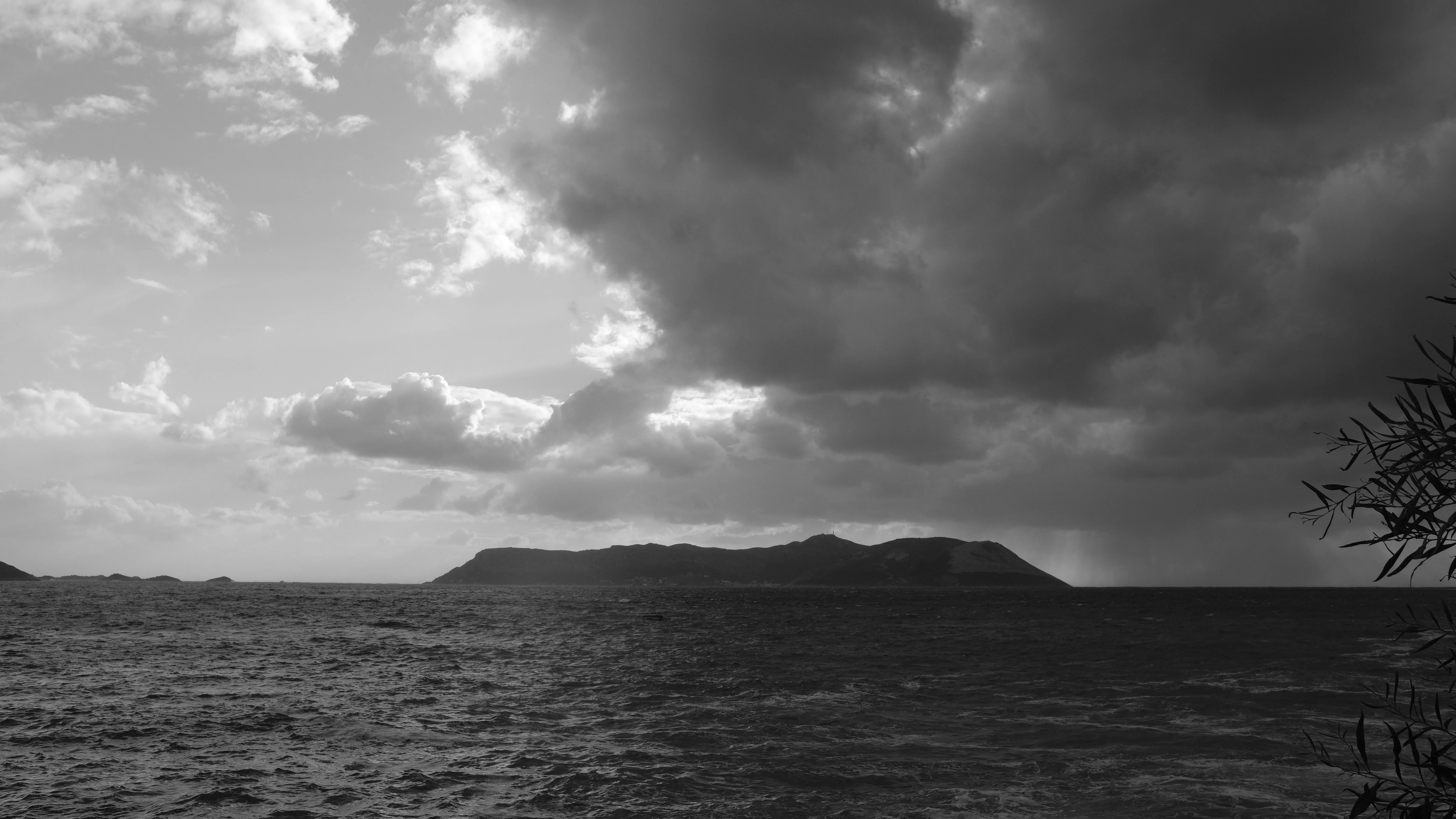 Black and White Seascape with Dramatic Clouds Wallpaper