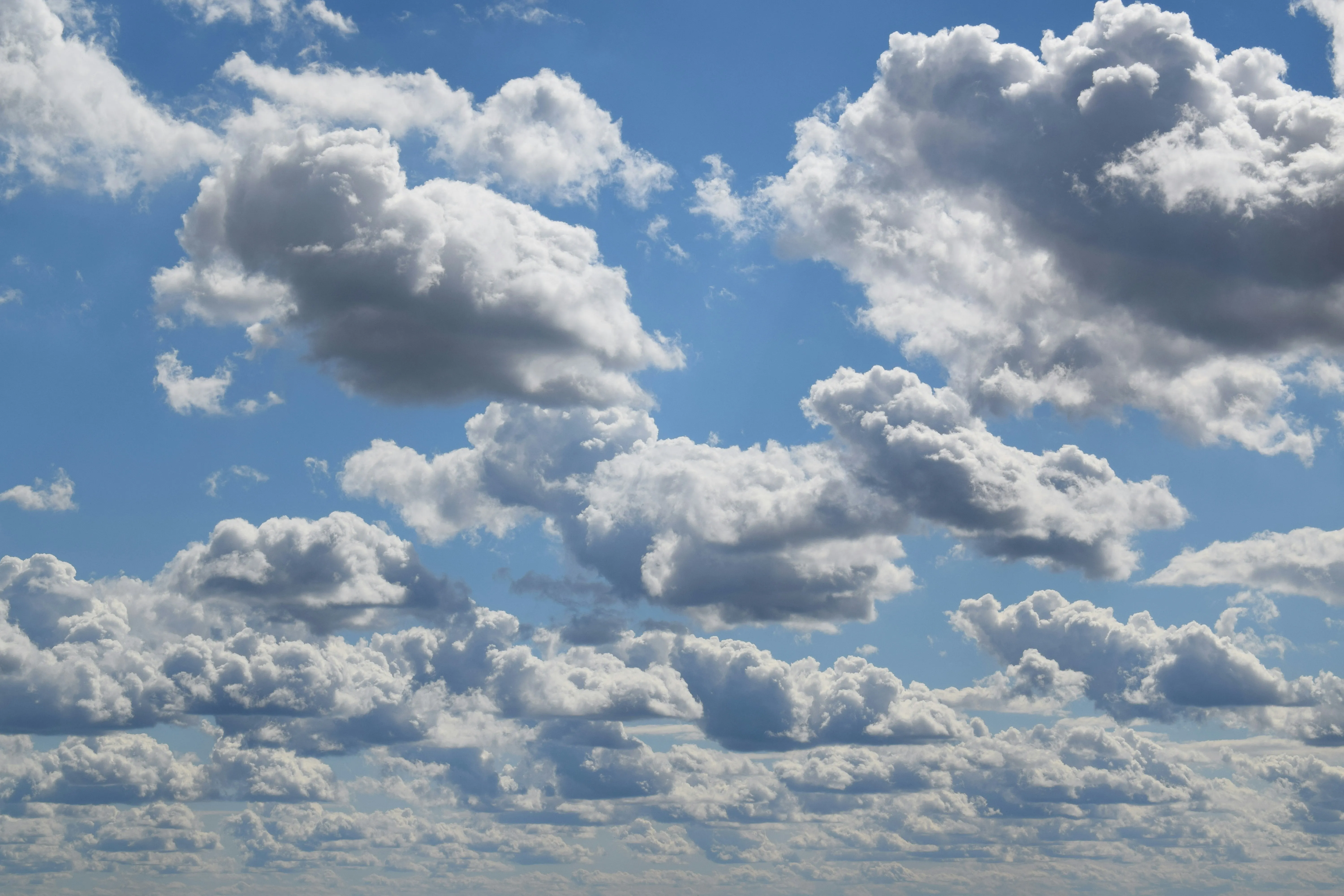 Blue Sky Filled with Puffy Clouds on a Sunny Afternoon