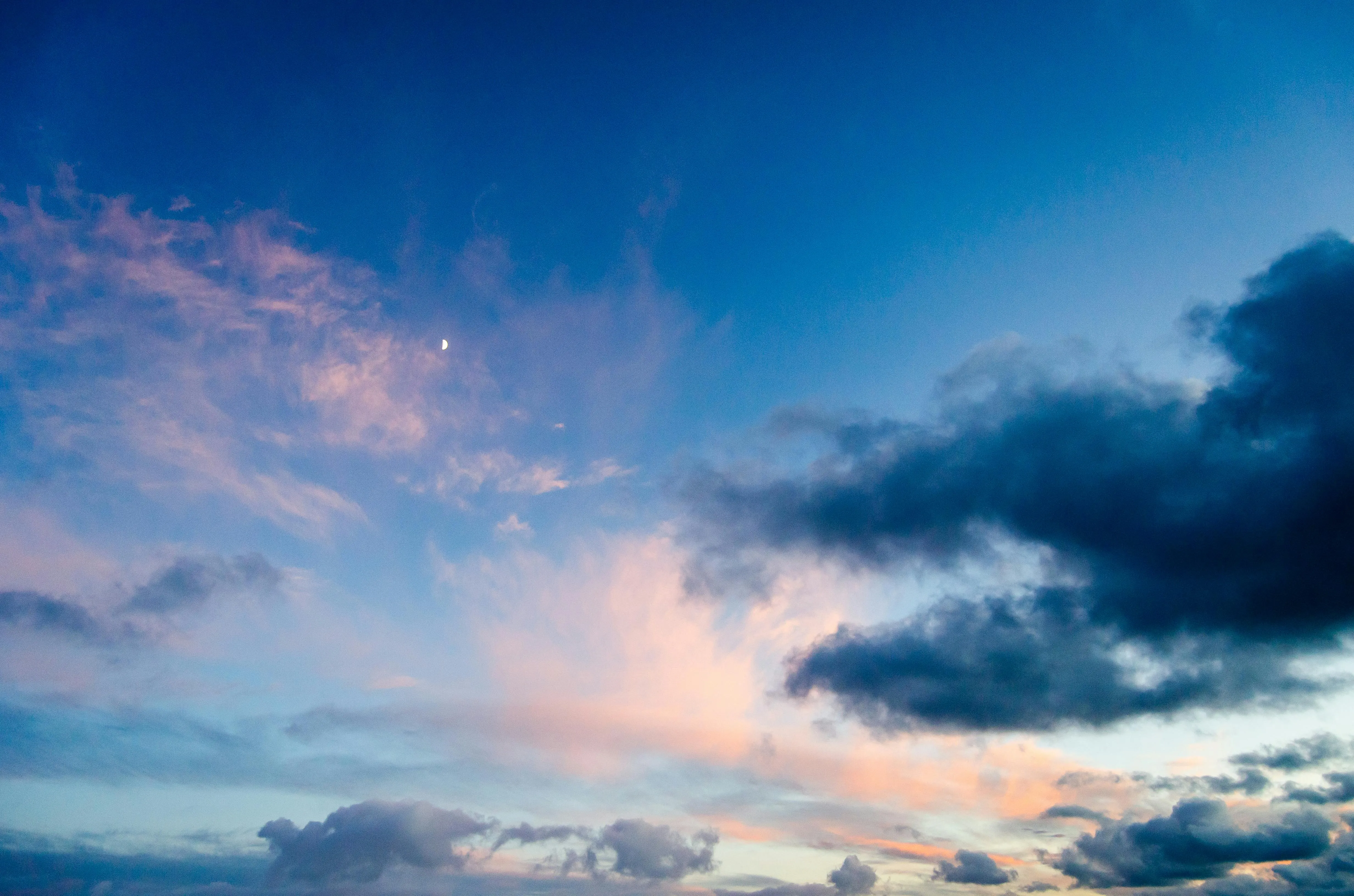 Blue Sky with Light Clouds Over Rural Landscape Wallpaper
