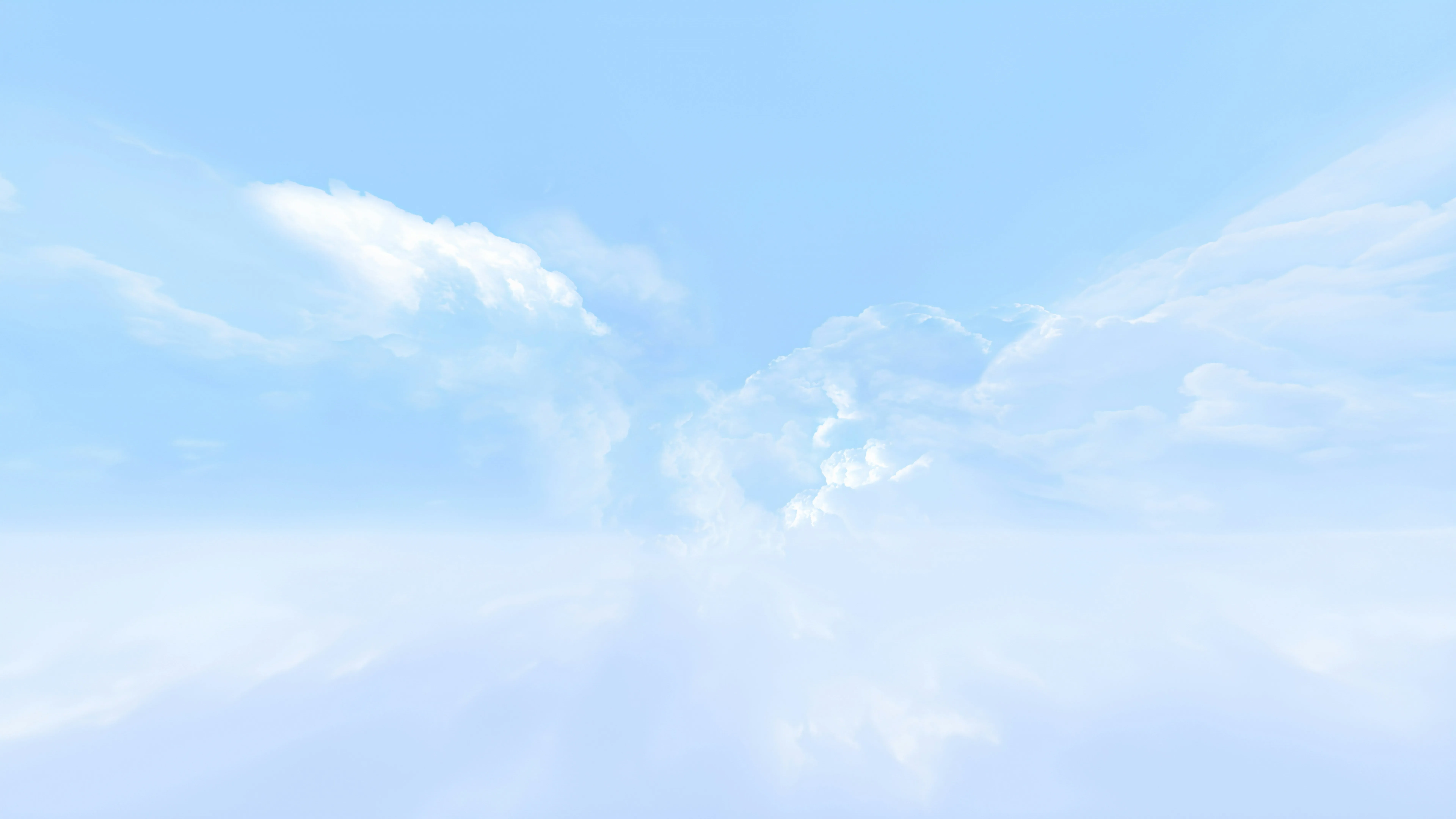 Bright Sky with Soft White Clouds Shining with Sunlight