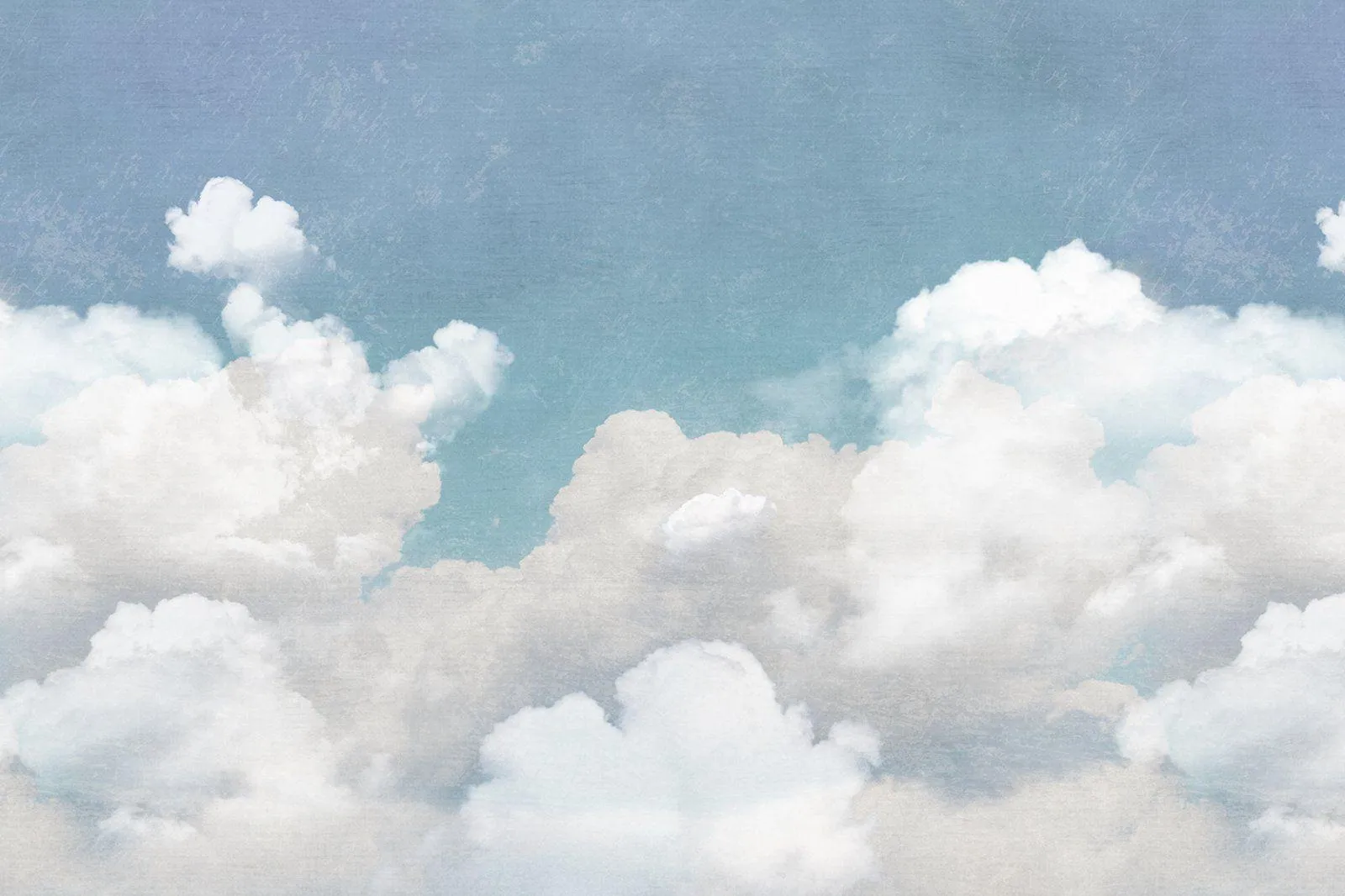 Bright White Clouds Floating Peacefully Against Blue Sky