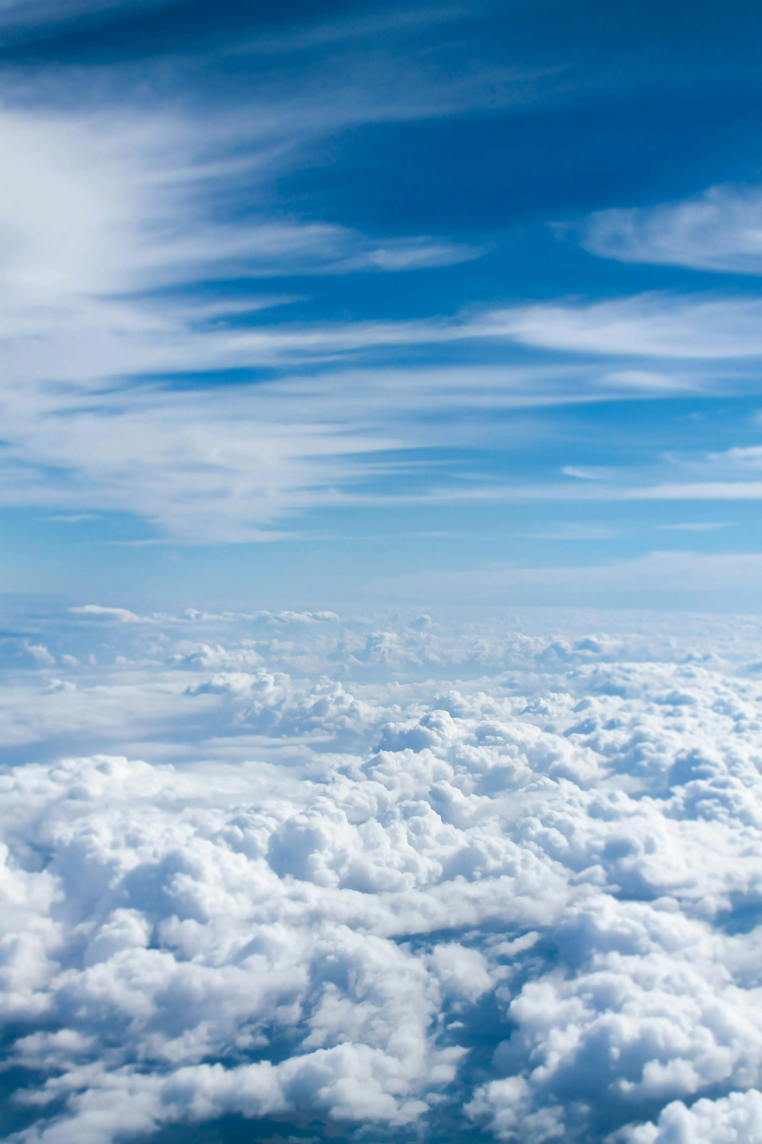 Bright White Clouds Forming a Soft Blanket Over Blue Sky