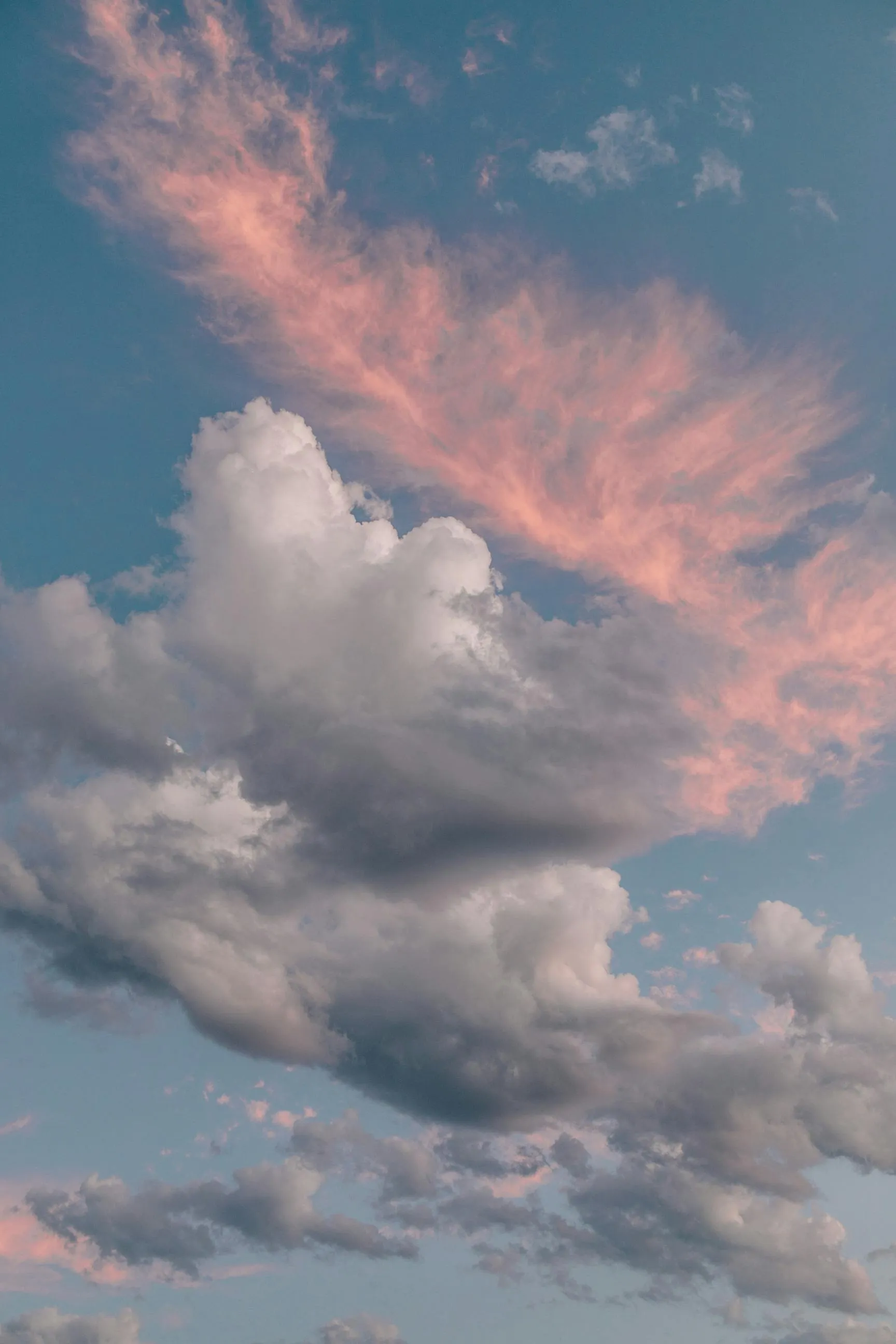 Calm Evening Sky with Pink Streaked Clouds on Horizon