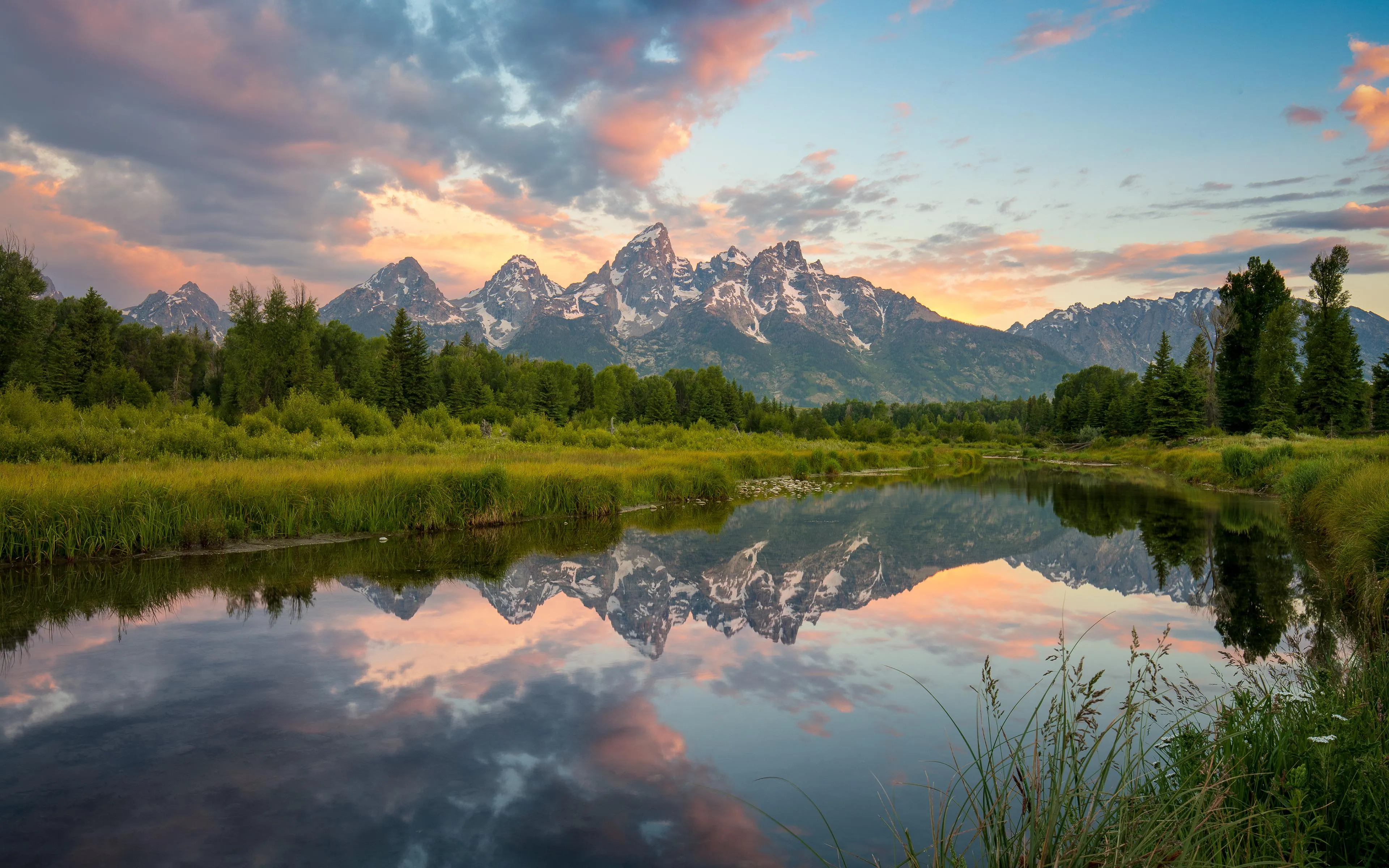 Calm Lake Reflecting Mountains and Blue Sky Wallpaper