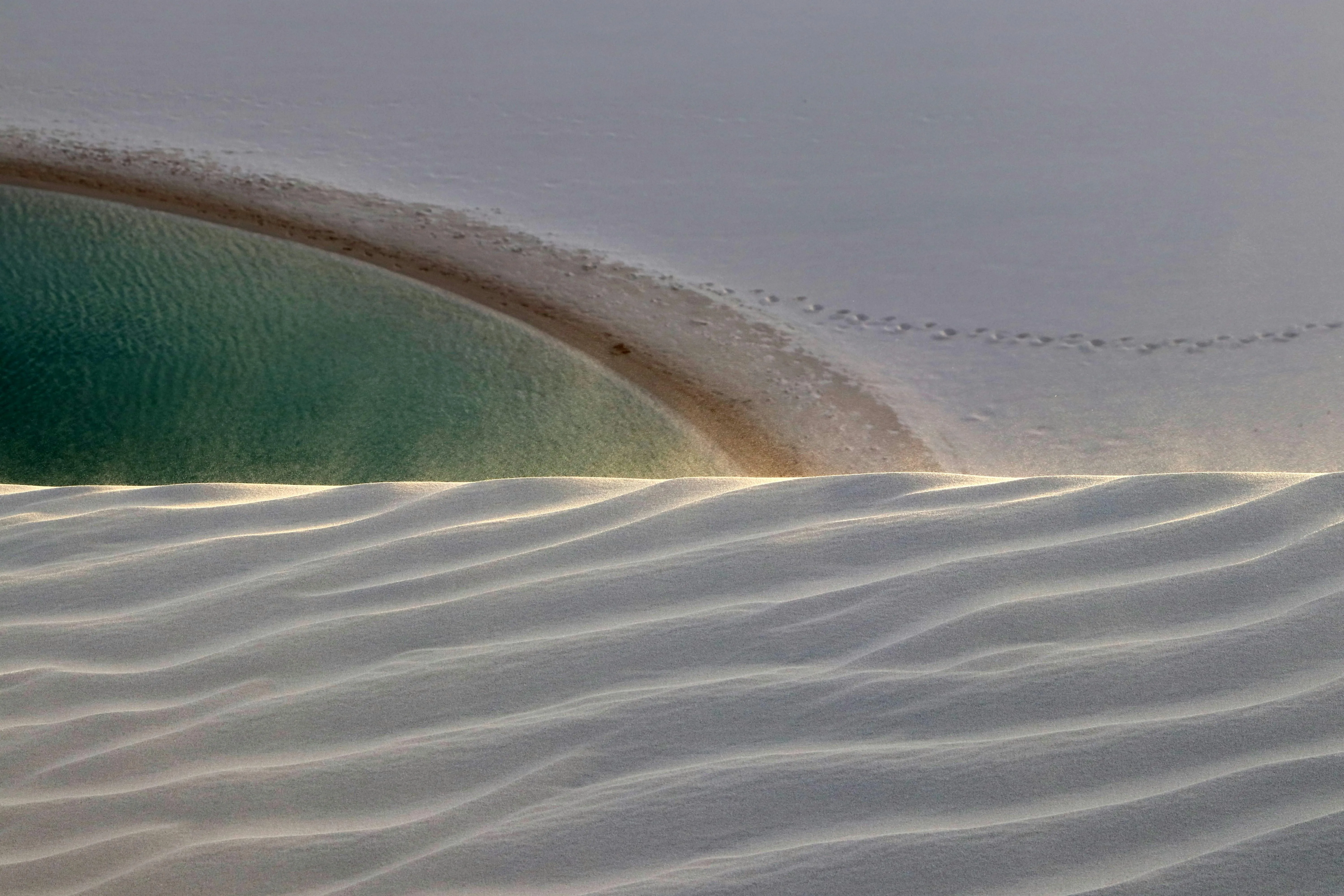 Calm Ocean Bay with Sandbar and Blue Green Waters Wallpaper