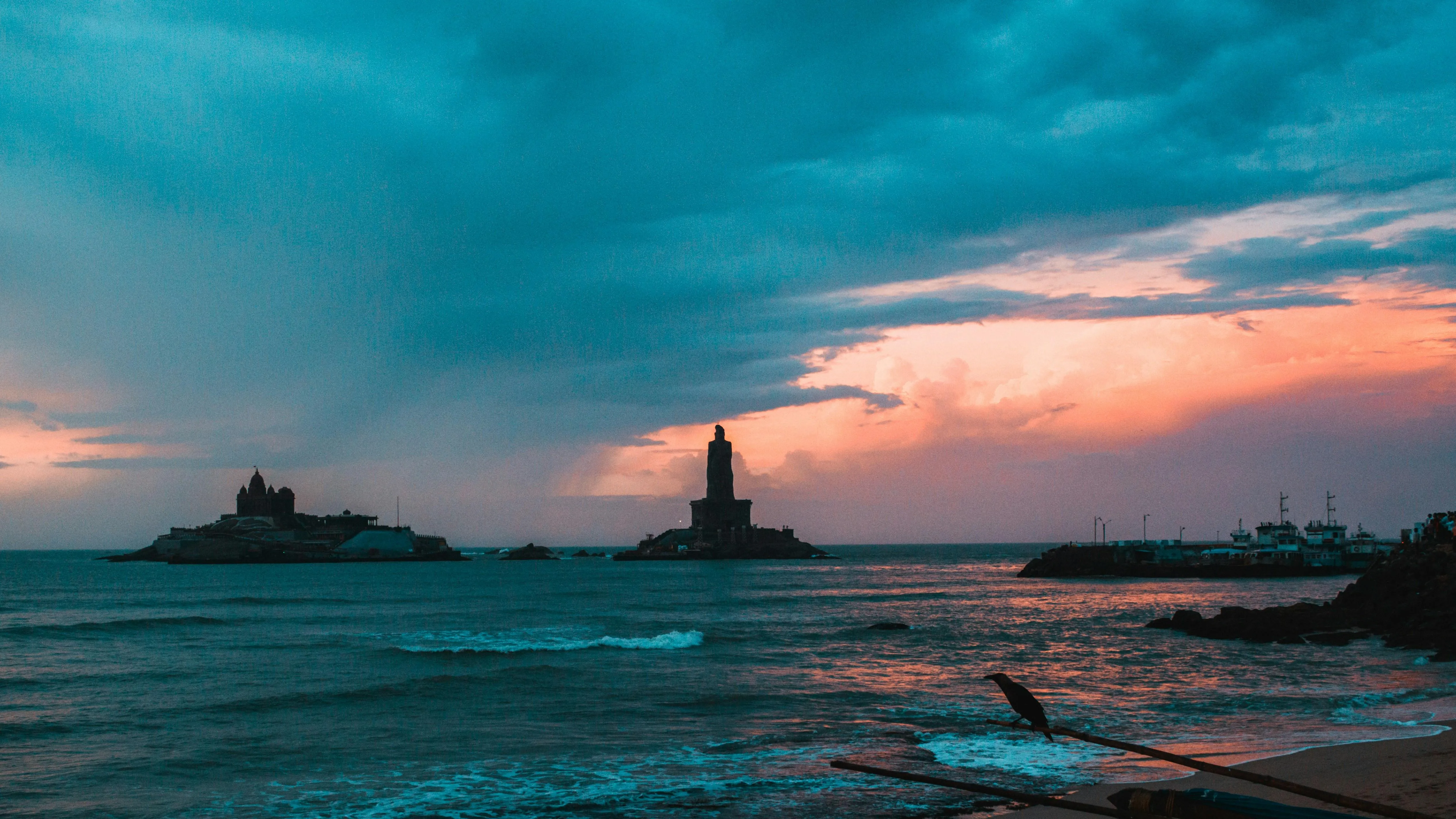 Calm ocean with wooden dock and turquoise blue water
