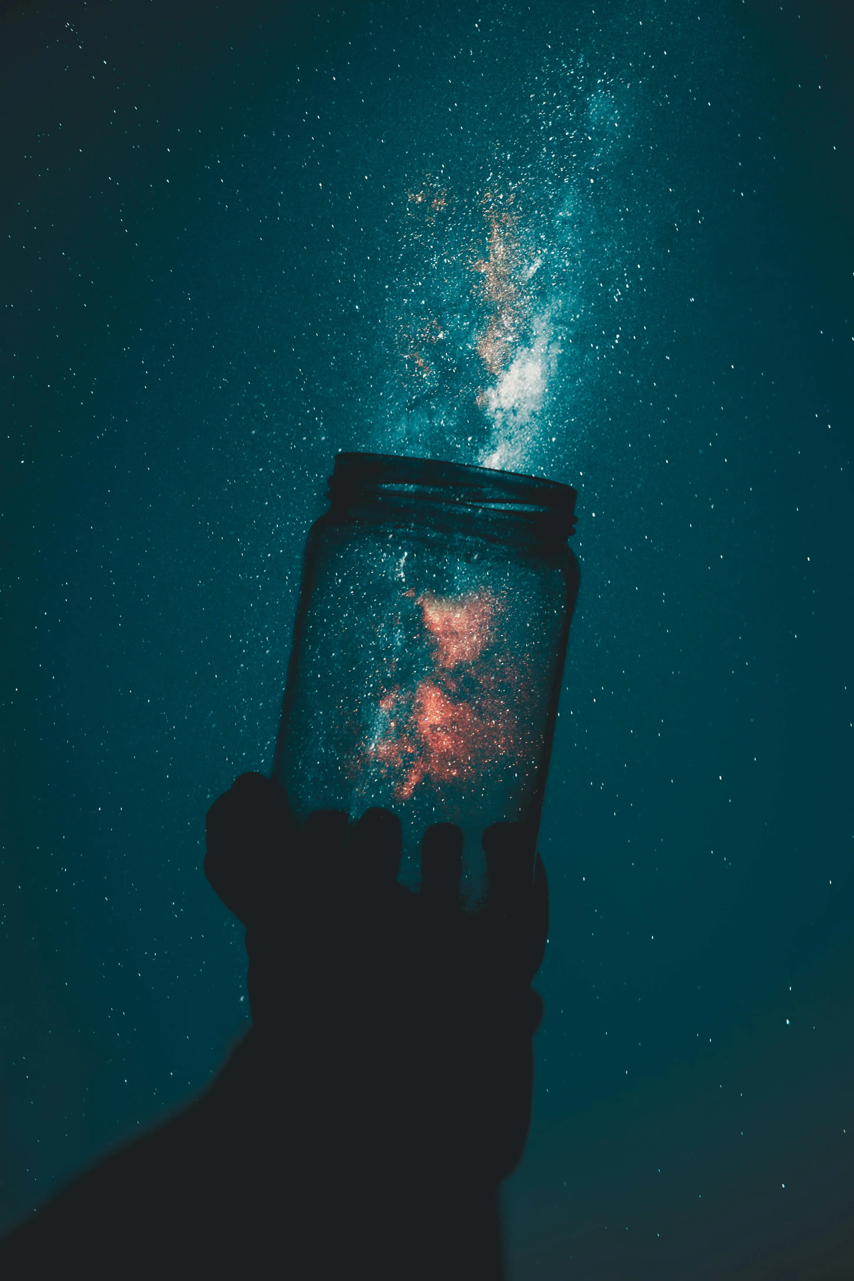 Capturing the Milky Way in a Jar Under a Starry Night Sky