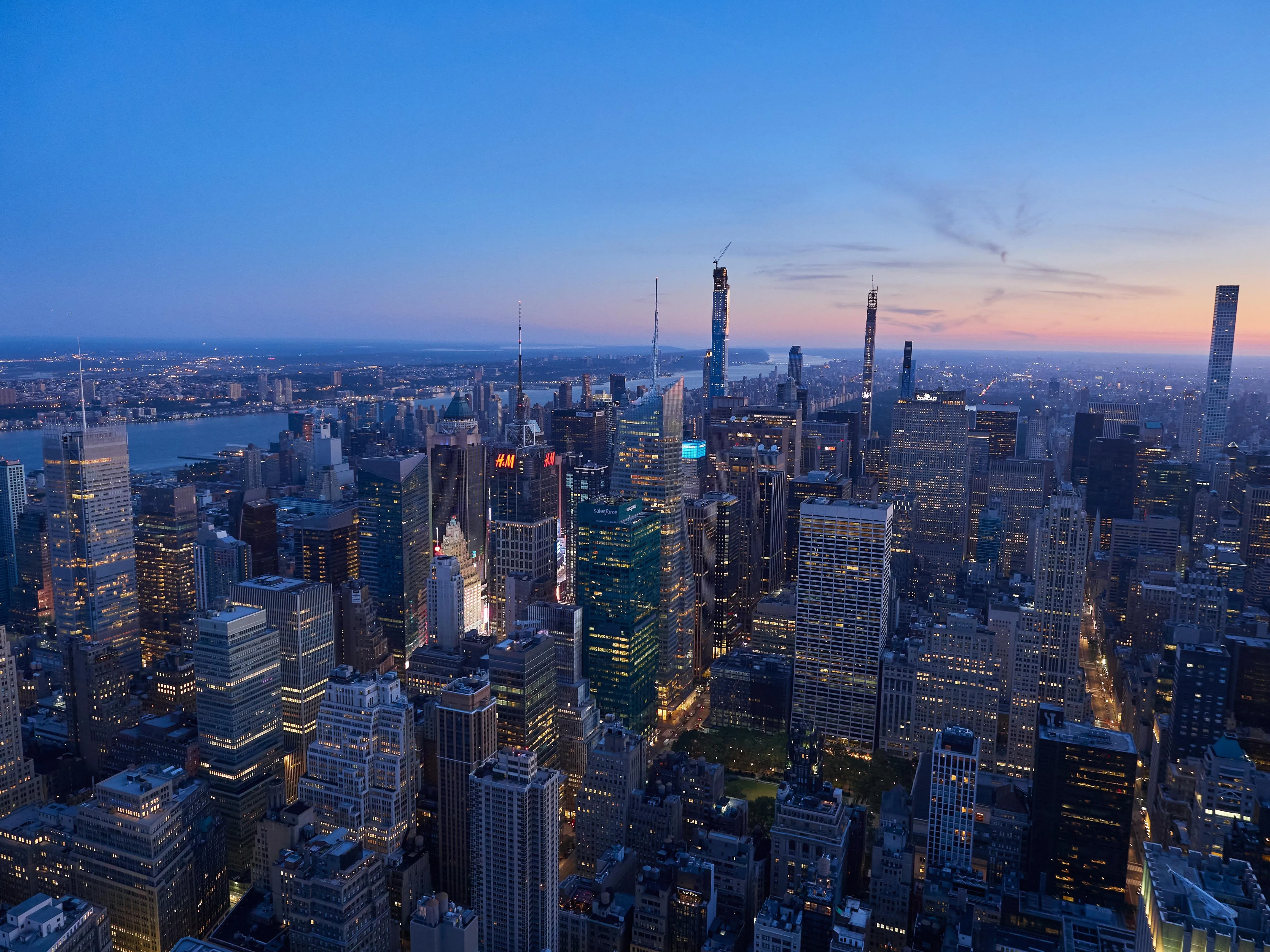 City skyline under clear blue sky at sunrise free HD image