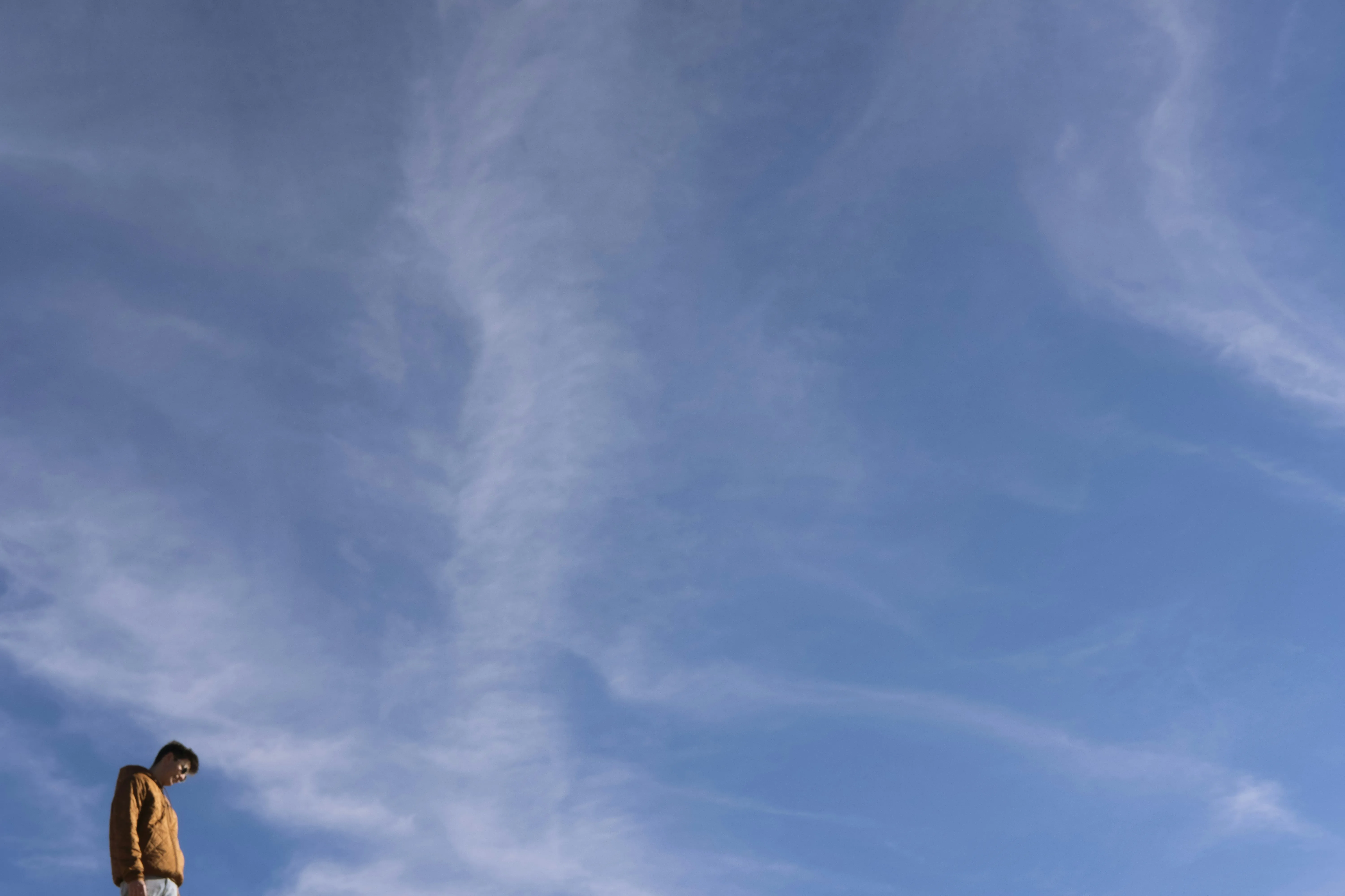 Clear Blue Sky with Long Thin Wispy Clouds on a Calm Day