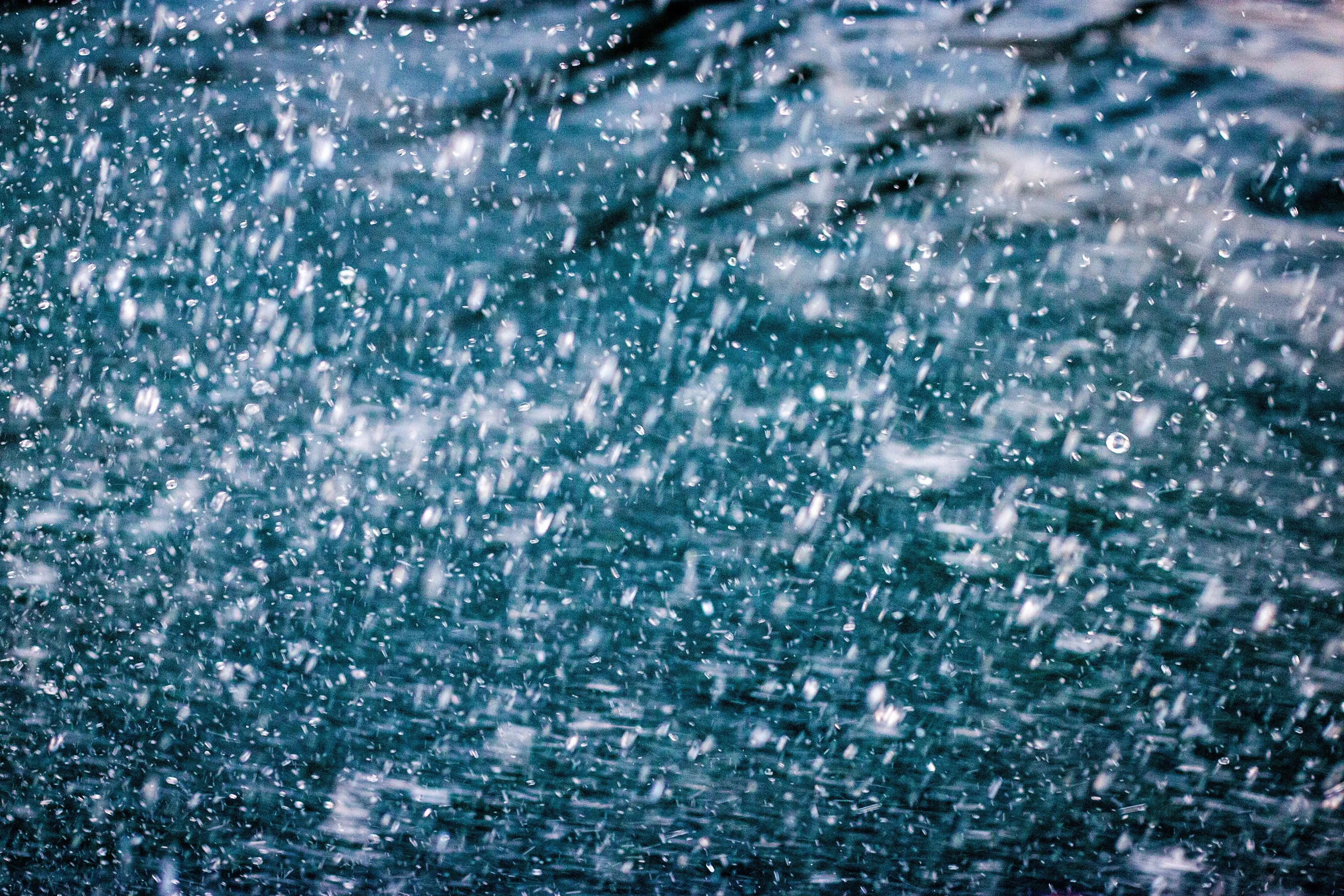 Closeup of Water Splashing on Pavement During Heavy Rainfall