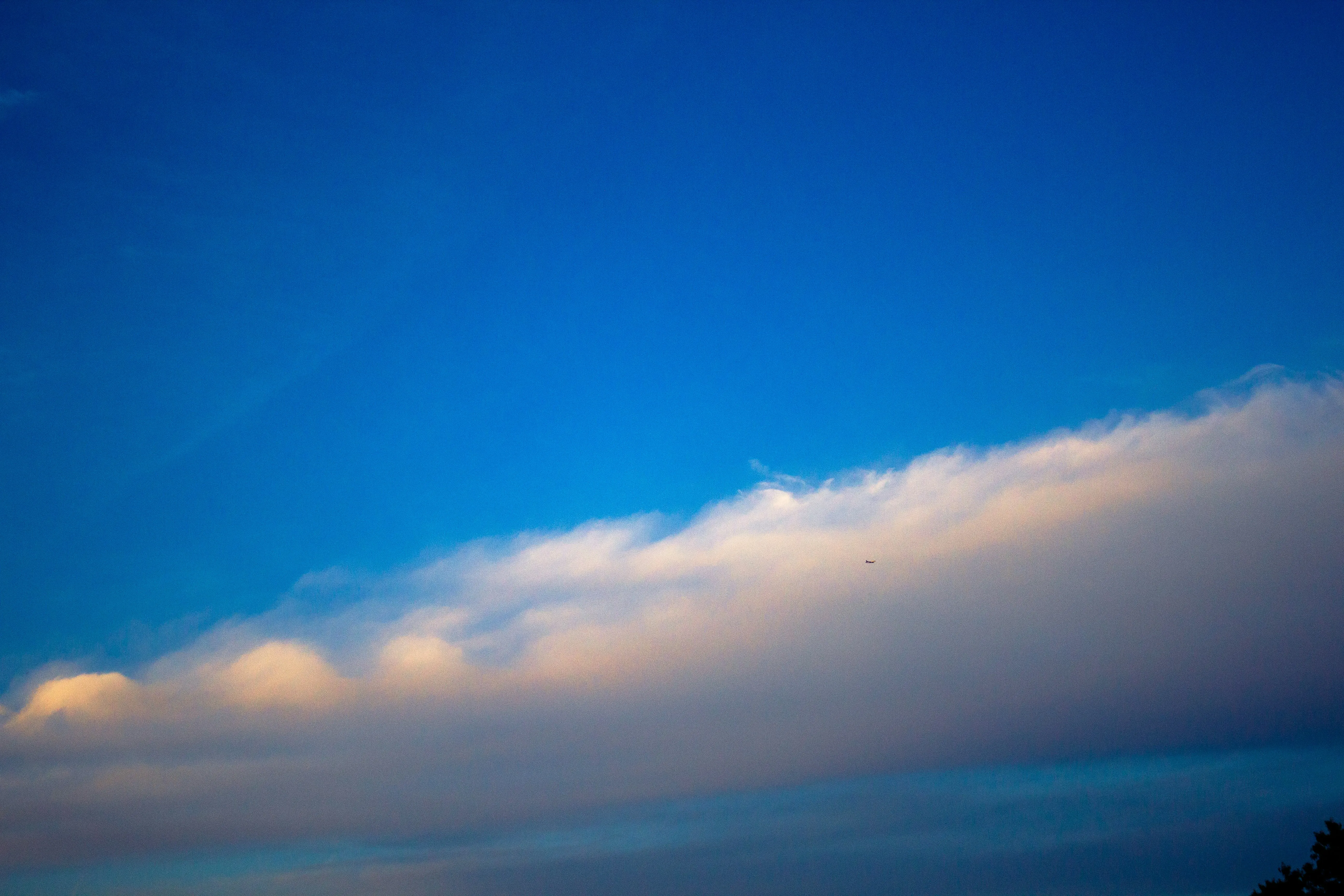 Cloud Line Formation Over Deep Blue Afternoon Sky Wallpaper
