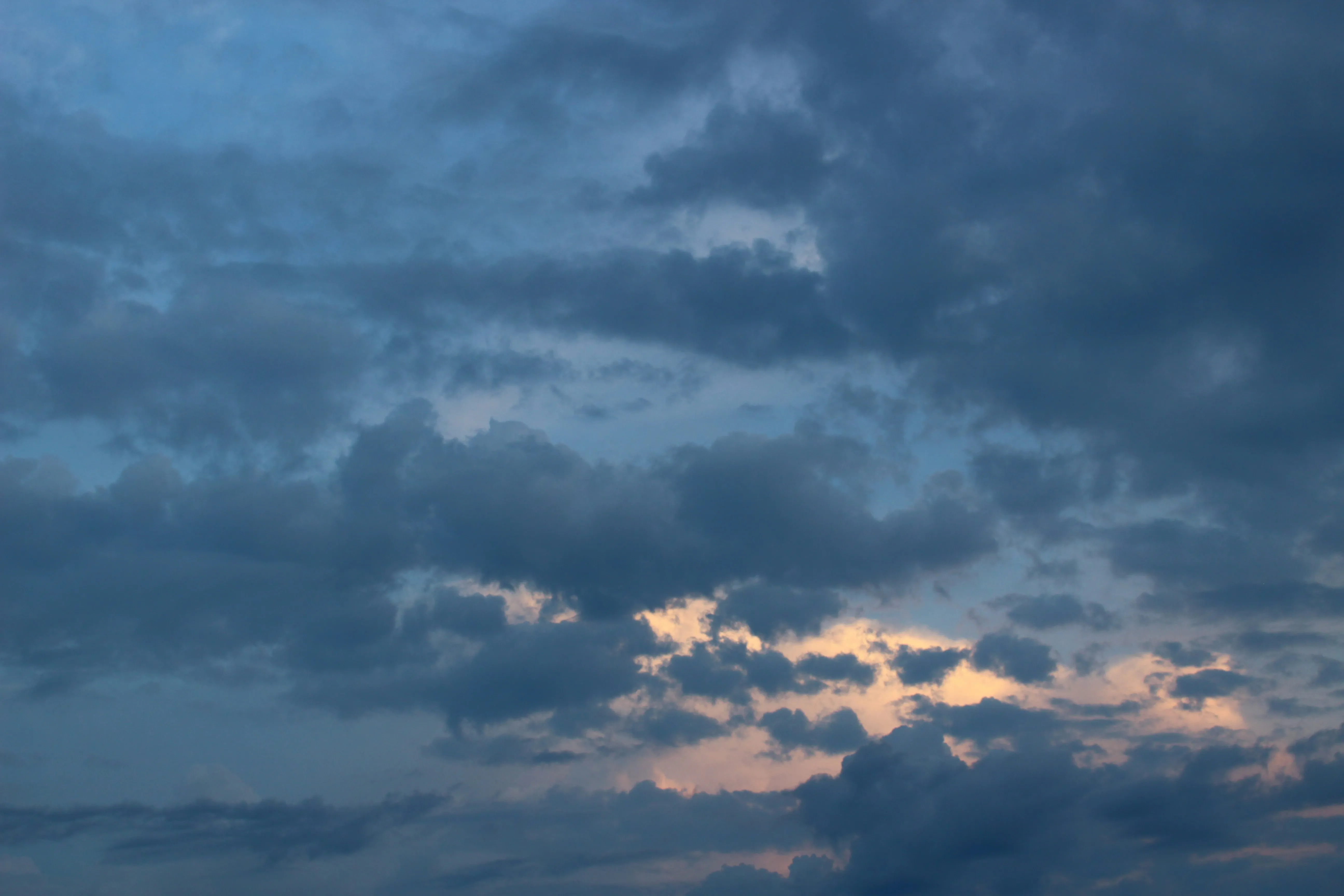 Clouds Beginning To Change Color During Evening Twilight