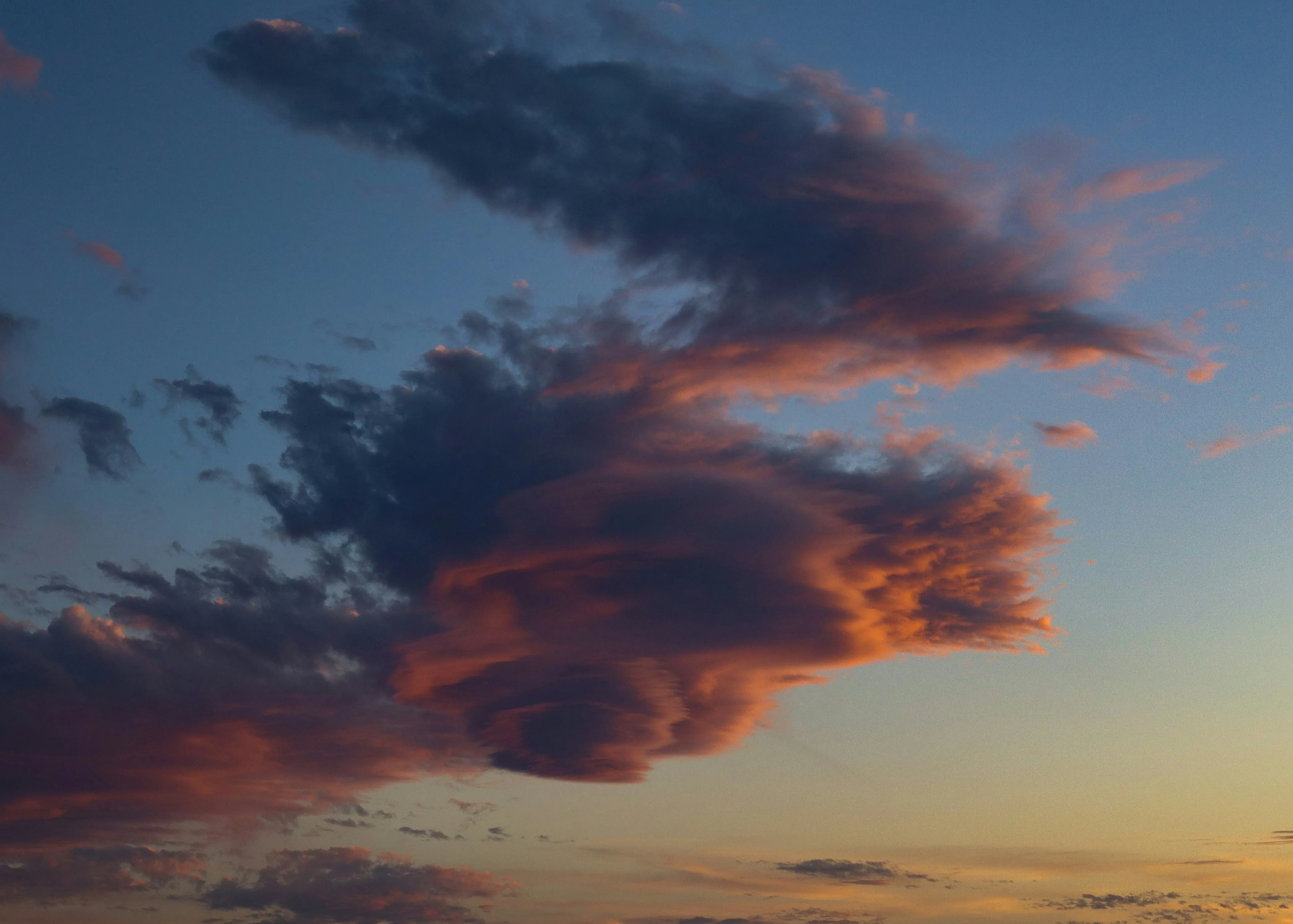Colorful Sunset Clouds Reflecting Warm Tones in the Sky