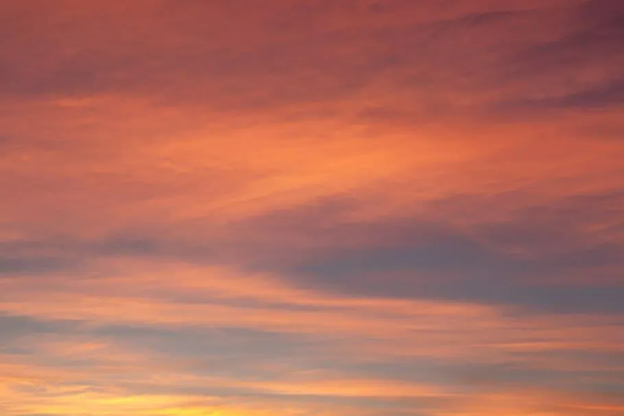 Colorful Sunset Sky with Pink and Orange Cloud Layers